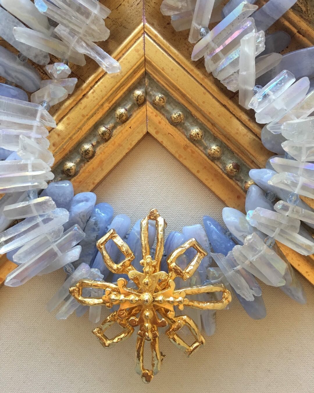Some pieces just stay in my mind and this is one of them. I enjoyed creating this beautiful necklace using blue chalcedony spears mixed with coated quartz spears to create a soothing backdrop for this awesome vintage designer cross. Thank you God for