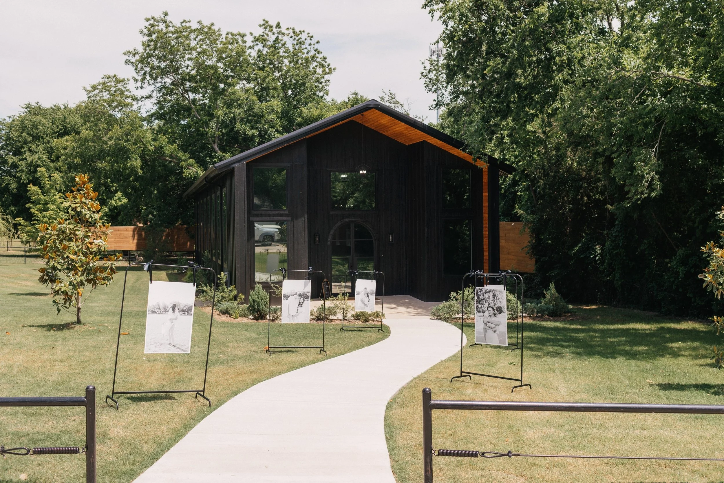 One of our favorite ceremony details: a photo display that transformed the entrance into a walk through the couple&rsquo;s story 🤍

Photography @cactusandcoastphotography 
Planner @emeraldandivyweddings 
Florist @hautepoppiesfloral 
Hair + makeup @r