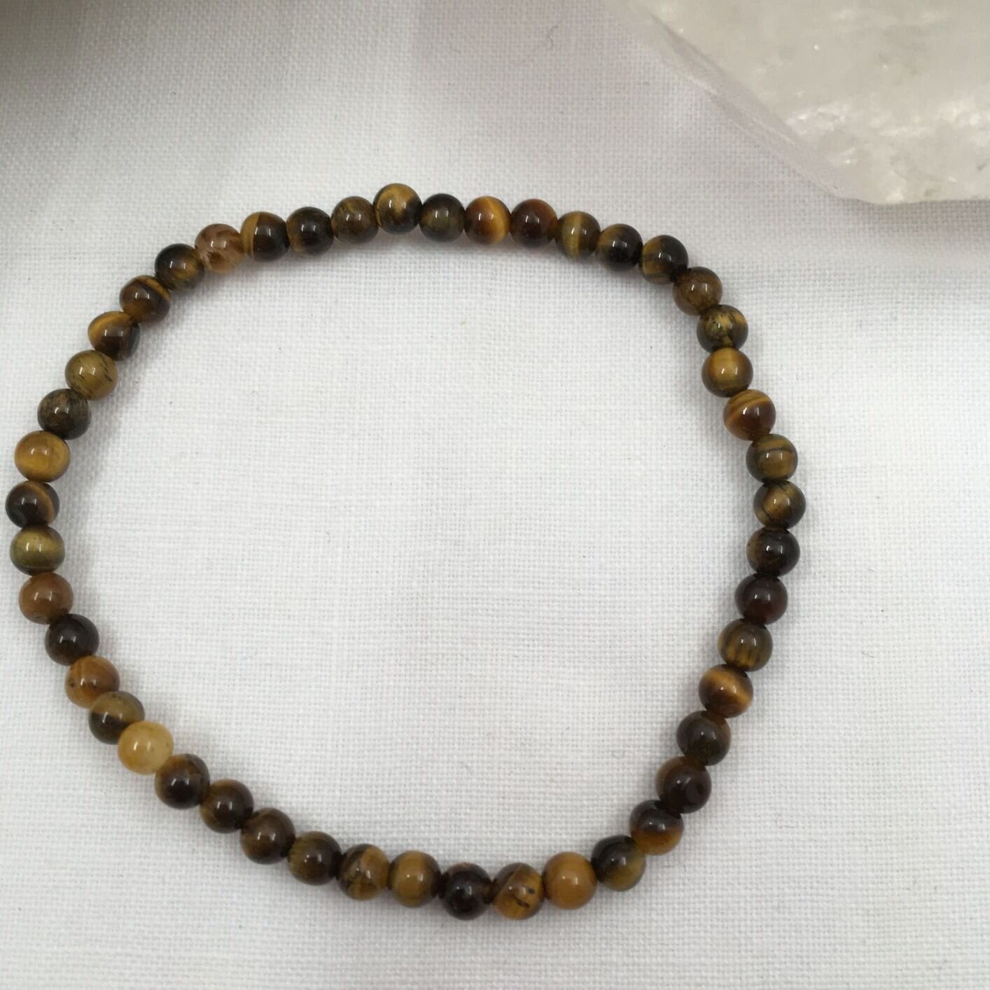 Bead 4mm Tigers eye 2.JPG