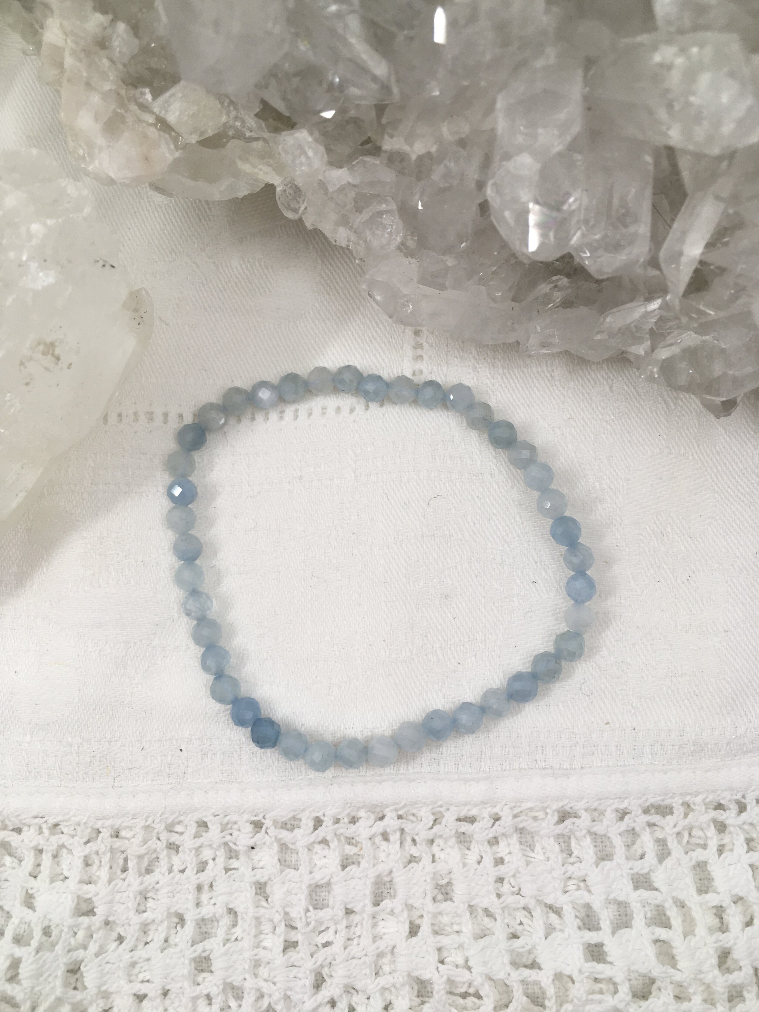 Aquamarine 4mm facet 2.jpeg