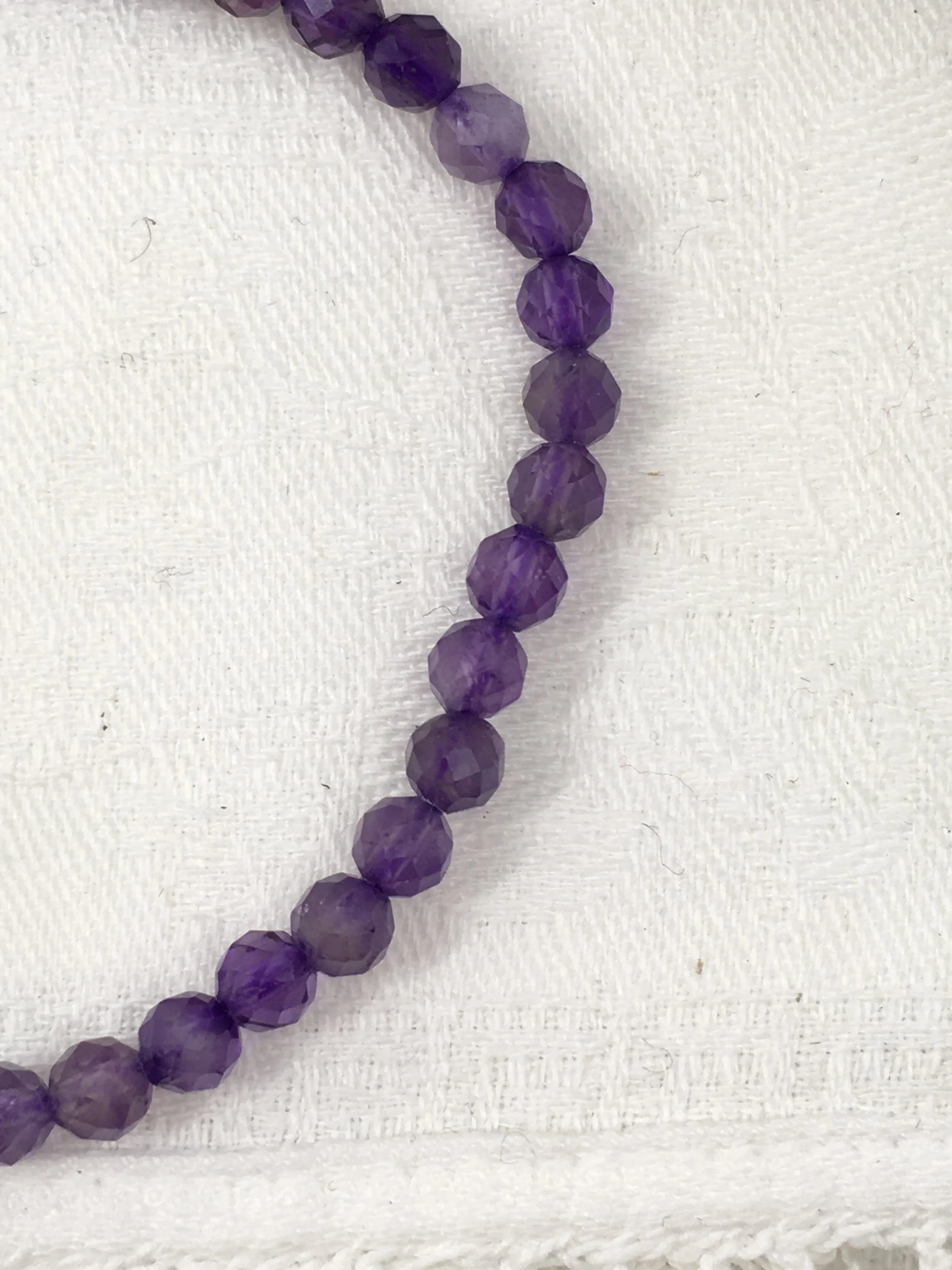 Amethyst 4mm facet 3.jpeg