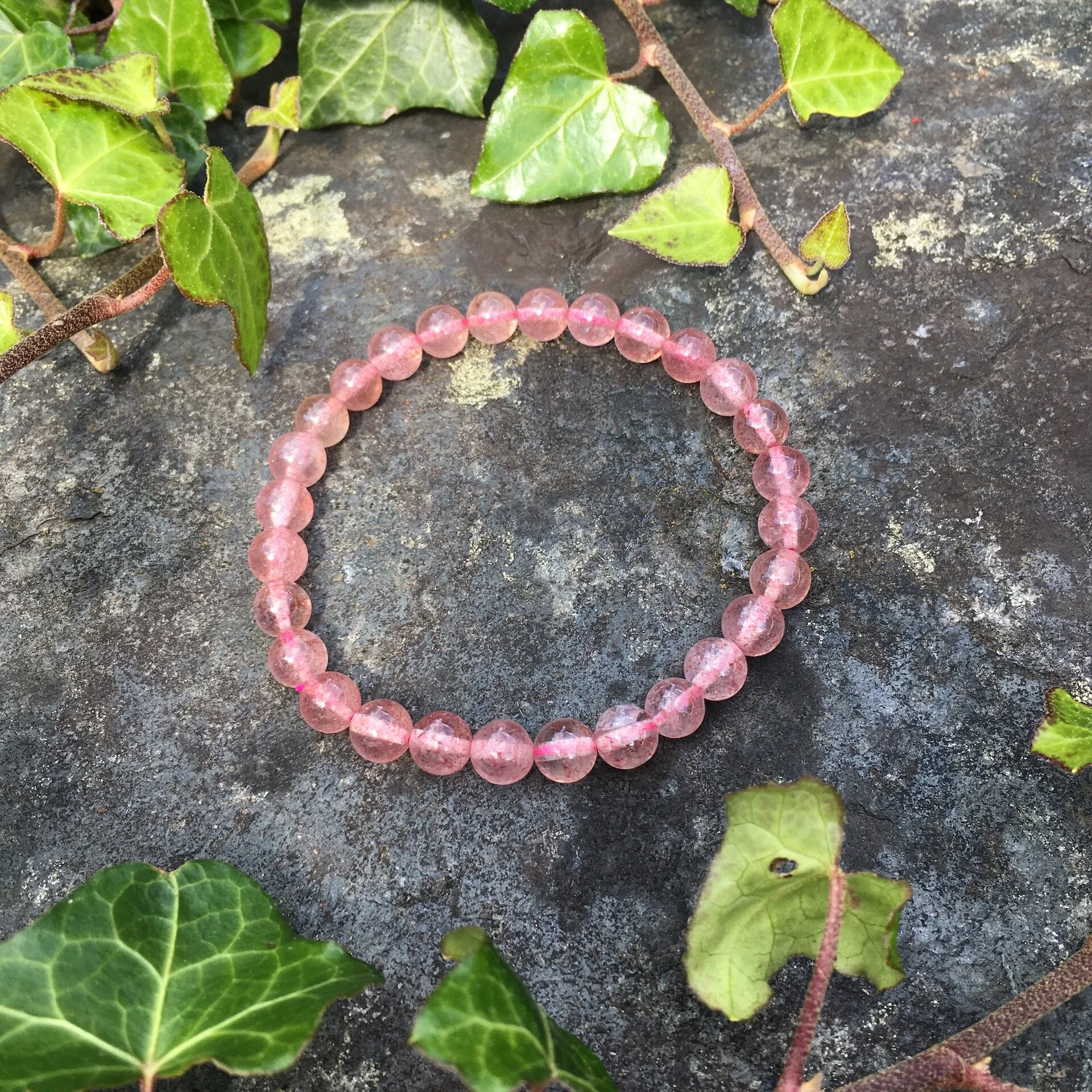 6mm Strawberry Q bead 1.jpeg