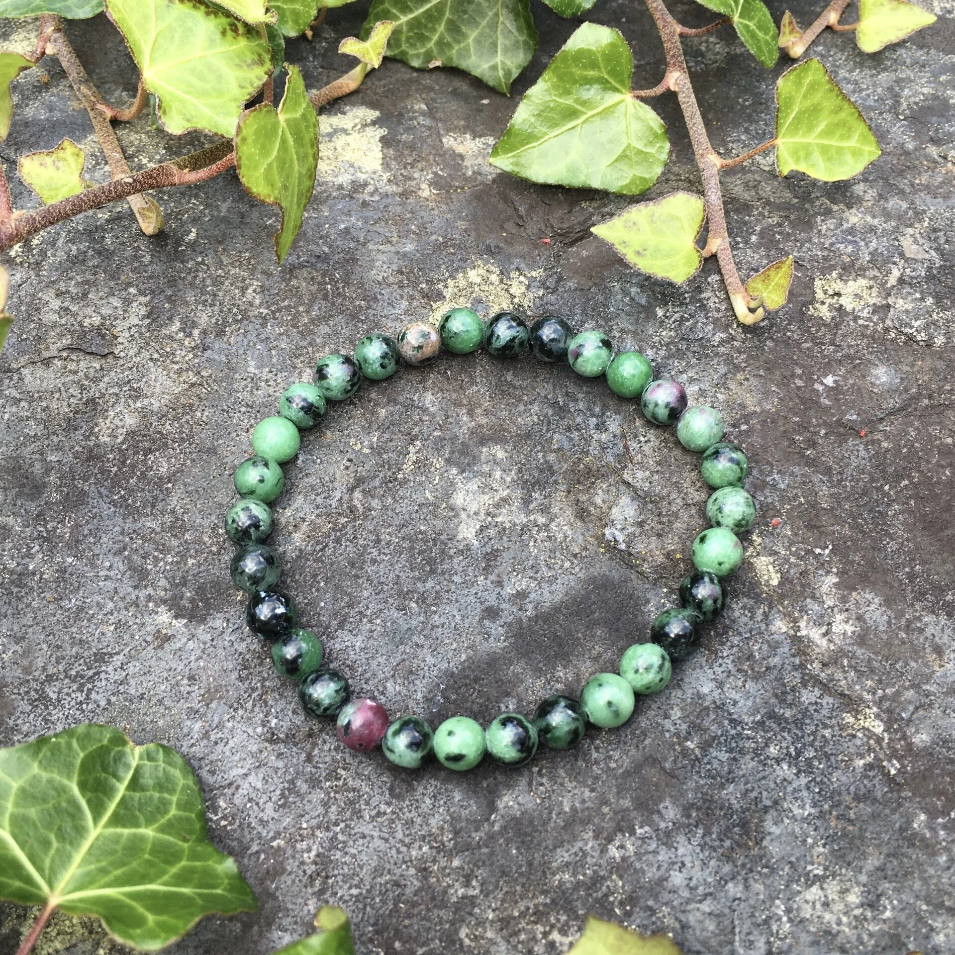 6mm bead Ruby in Zoisite 1.jpeg