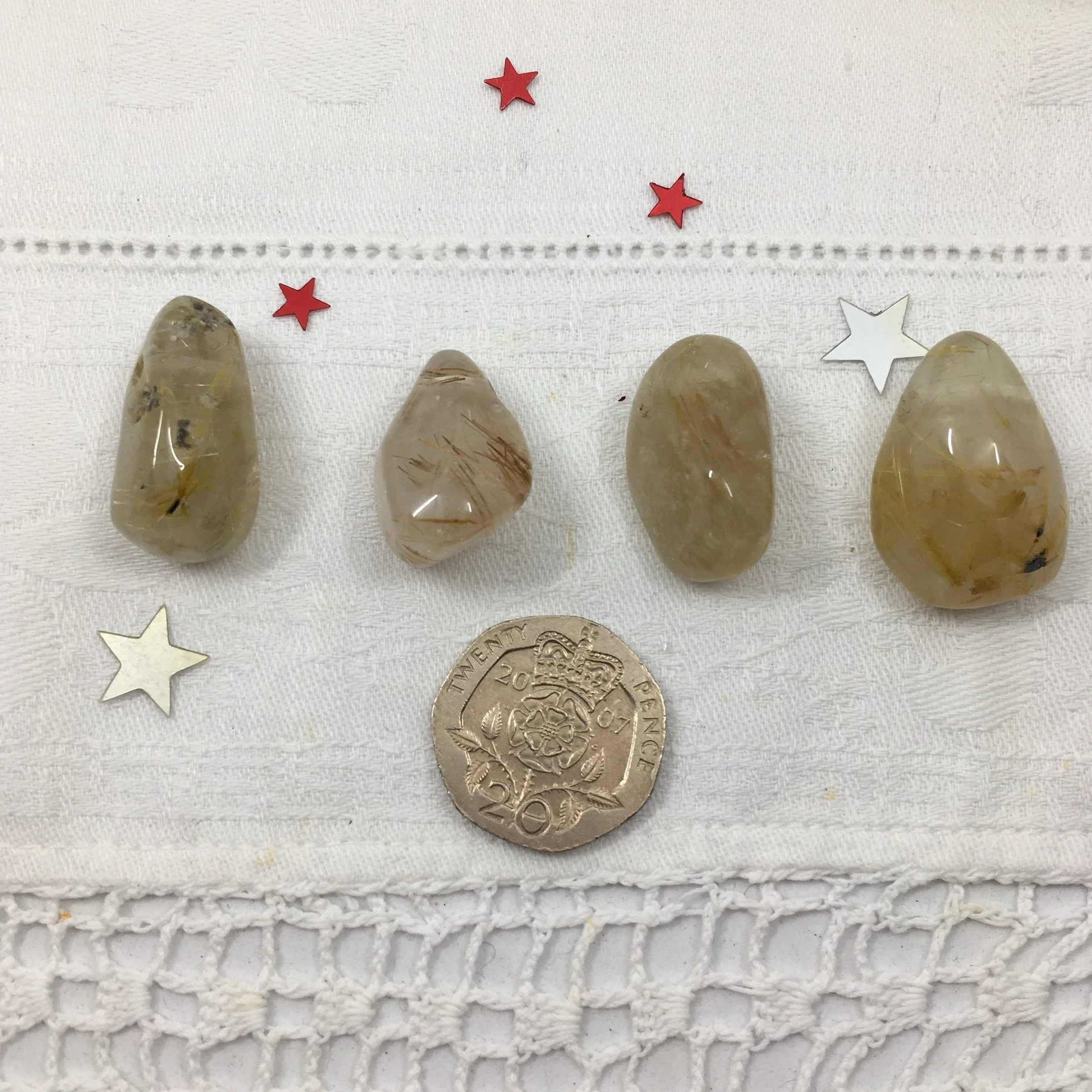 Rutilated quartz TS pendants.jpeg