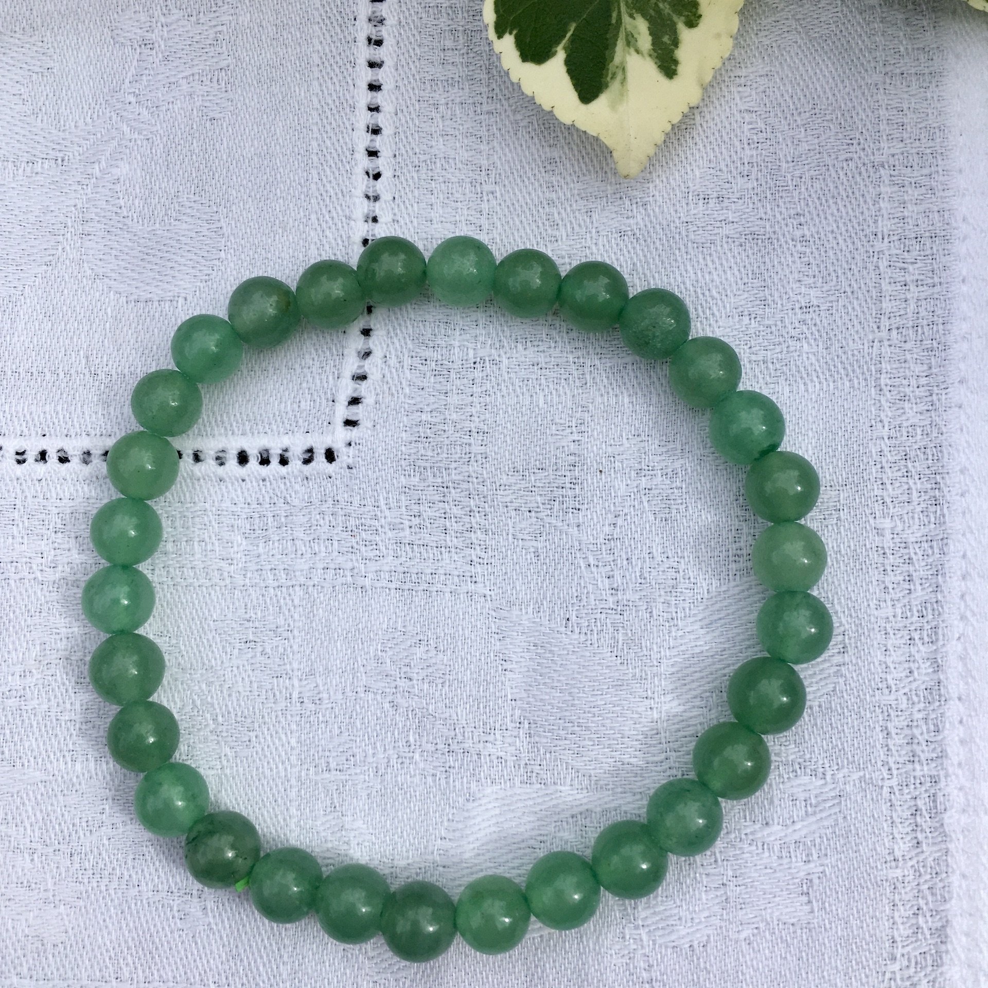 Green aventurine 6mm bead b.jpeg