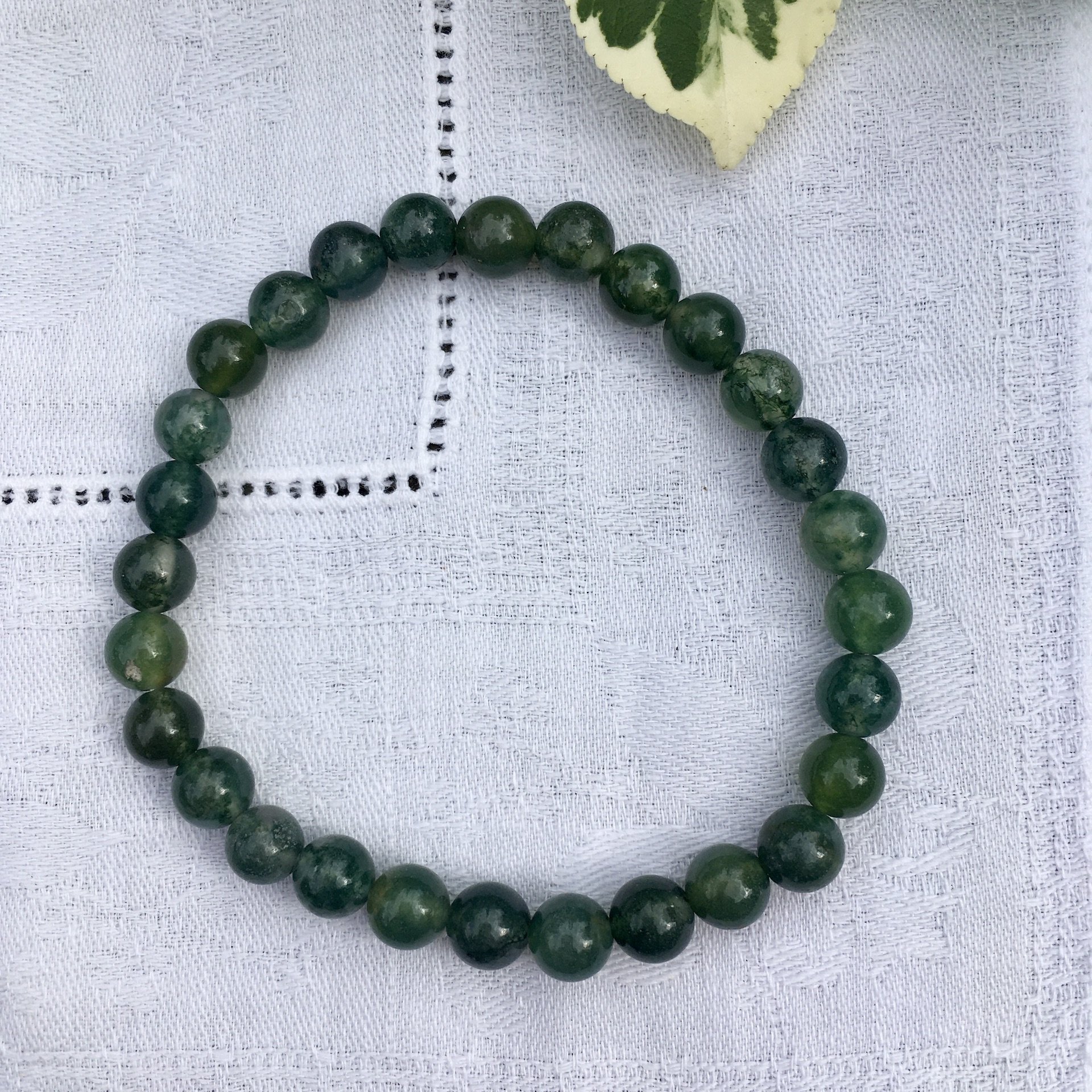 Moss agate 6mm bead b.jpeg