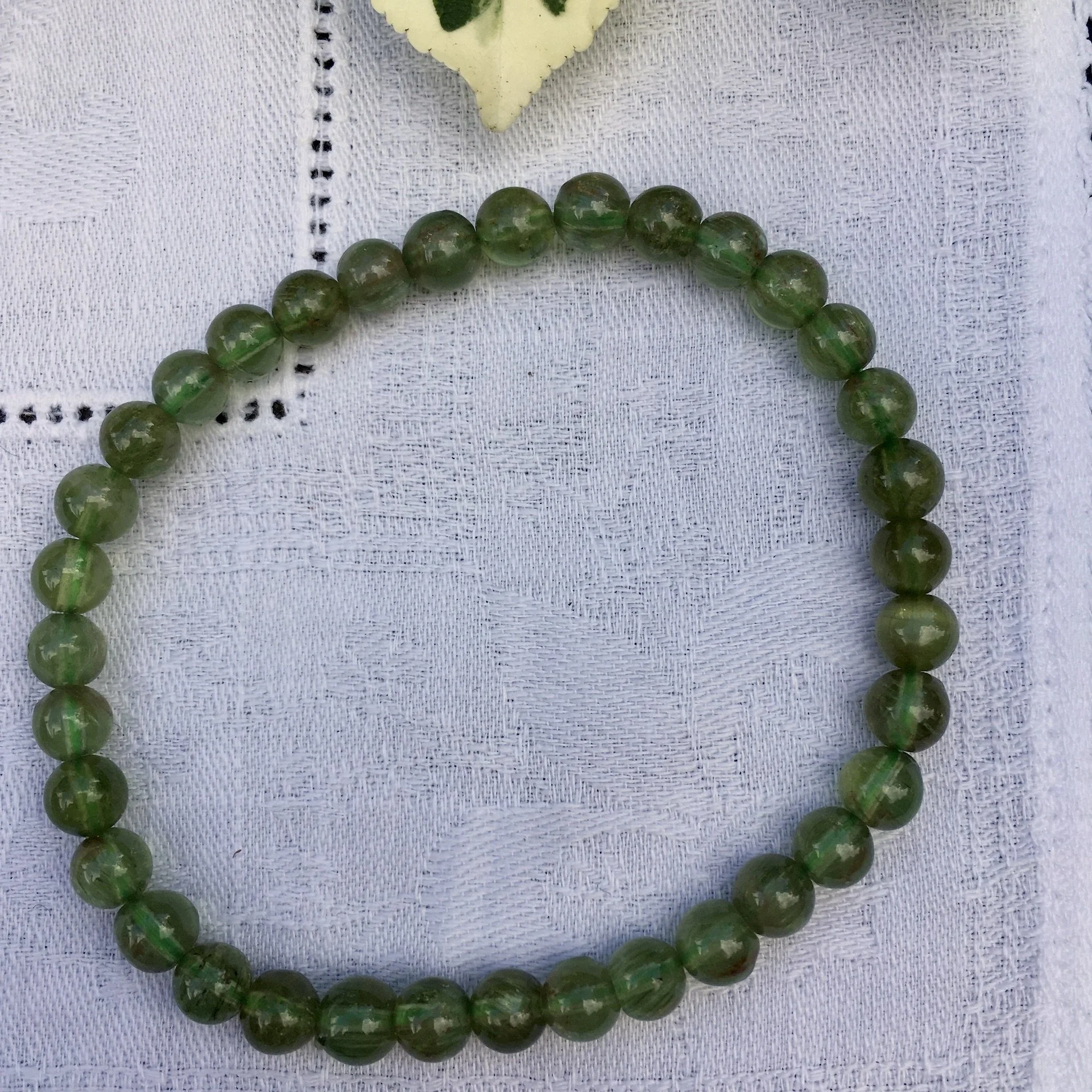 Green garnet 6mm bead b.jpeg
