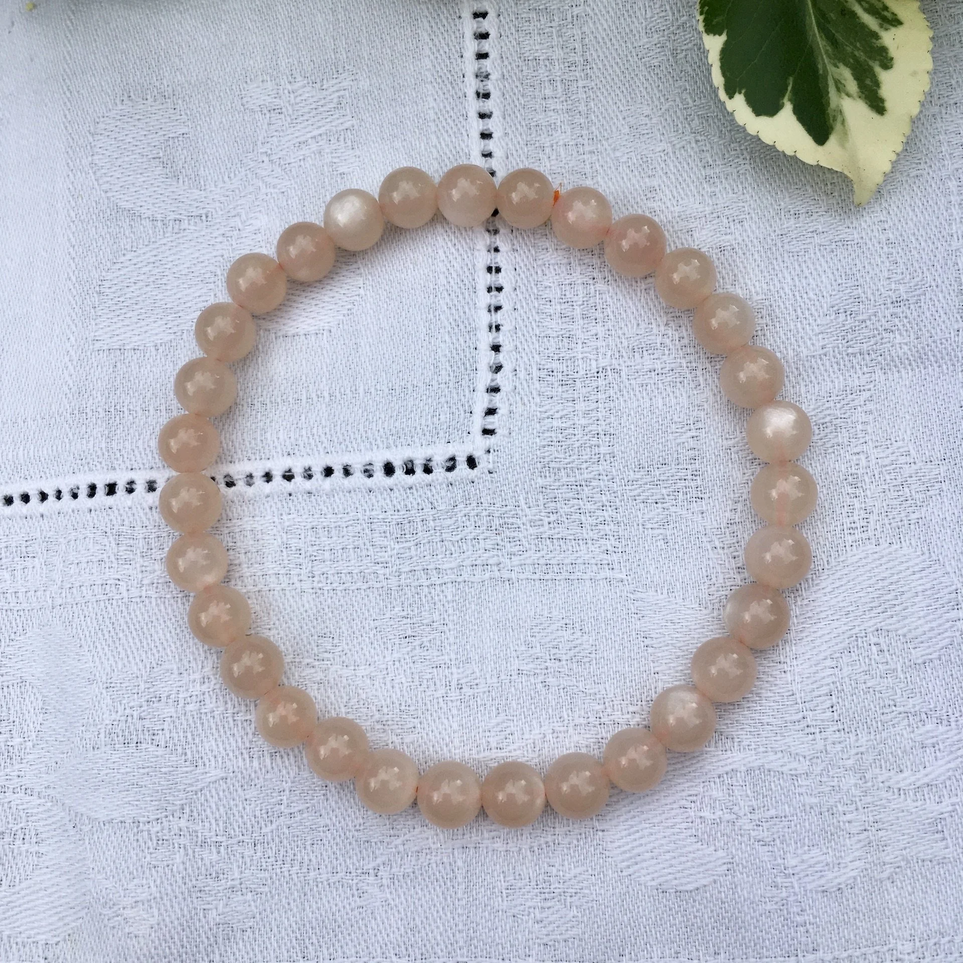 Peach moonstone bead 6mm b.jpeg
