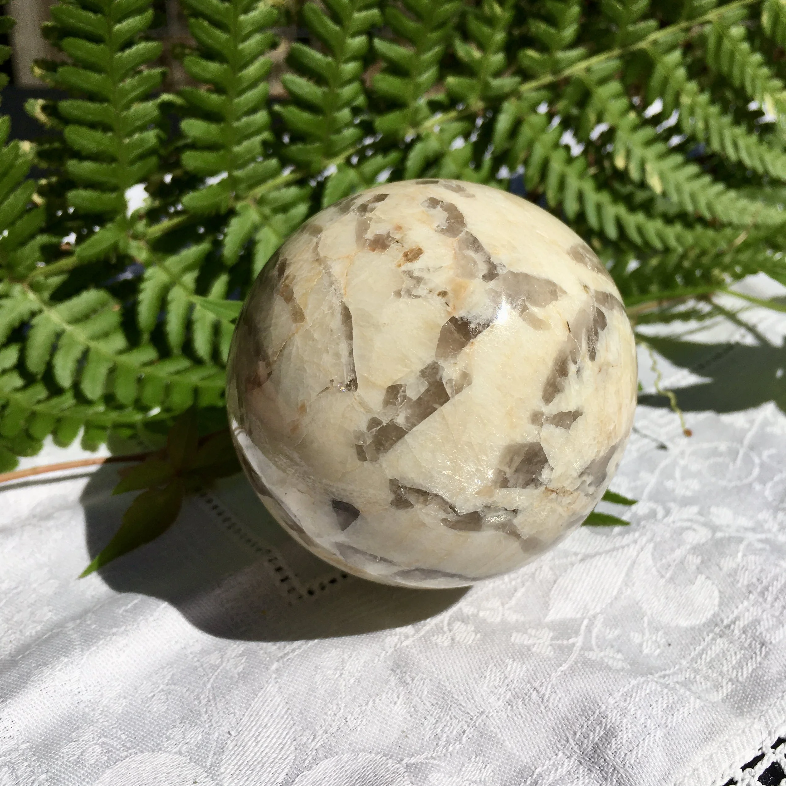 Smoky in moonstone sphere 2a.jpeg