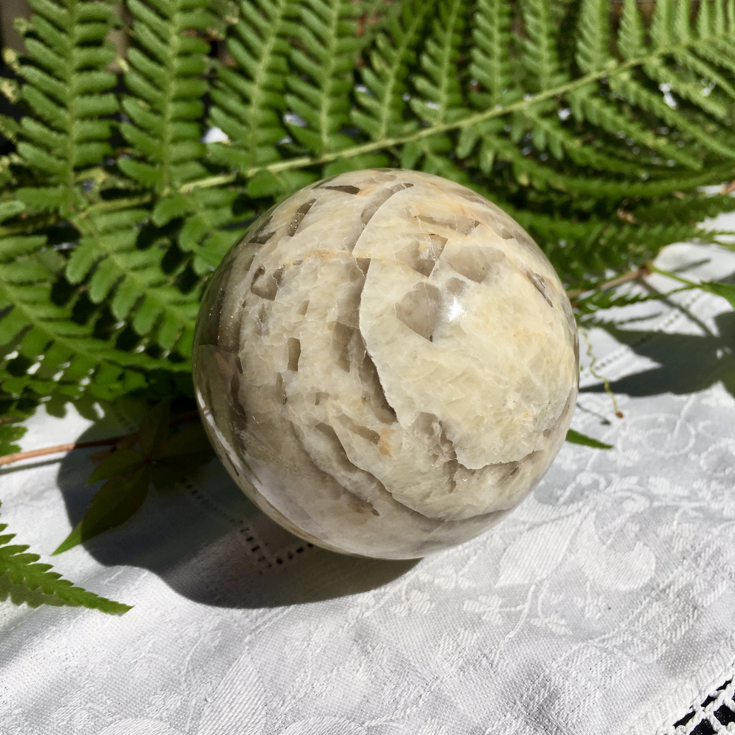 Smoky in moonstone sphere 3a.jpeg