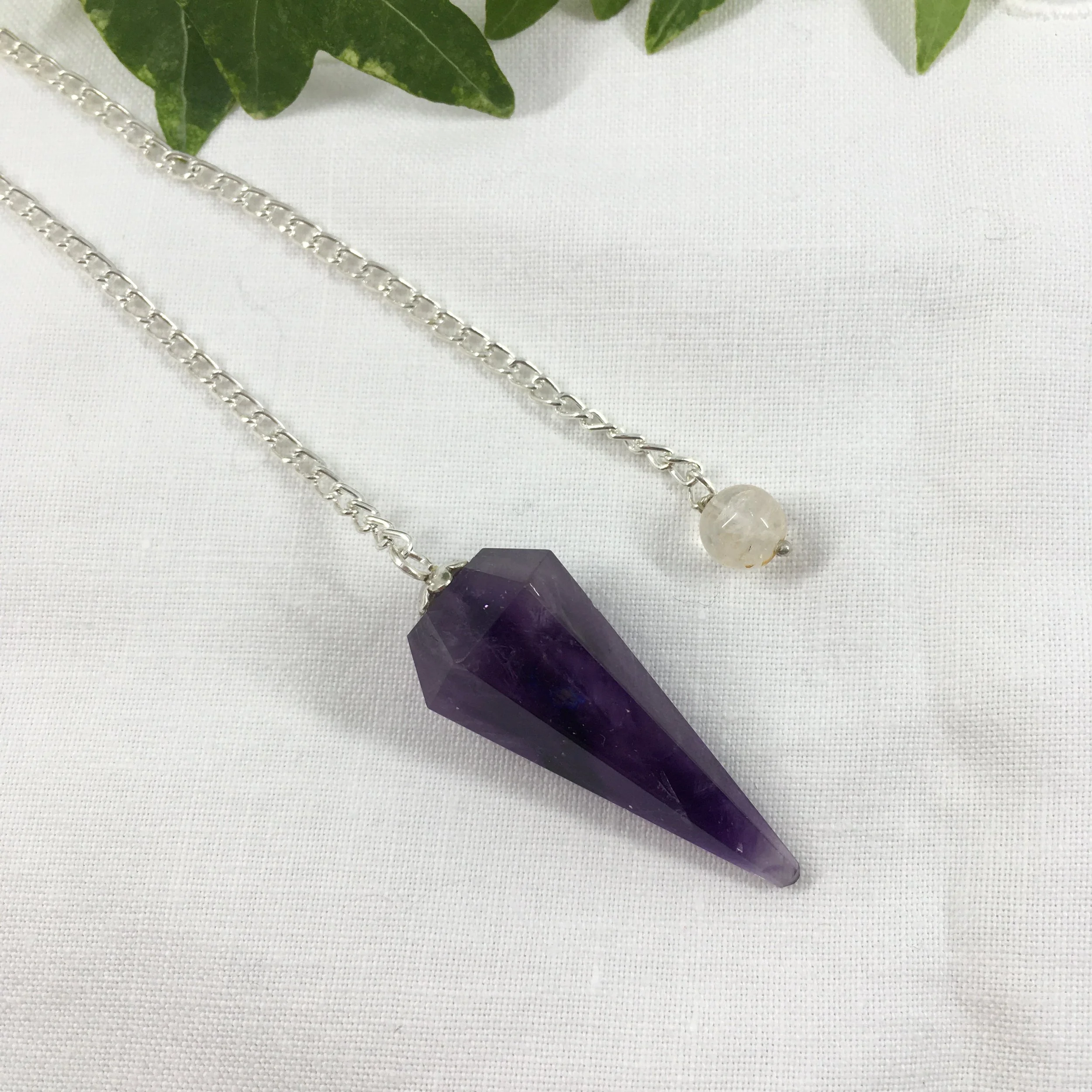 amethyst pendulum with quartz bead a.jpeg