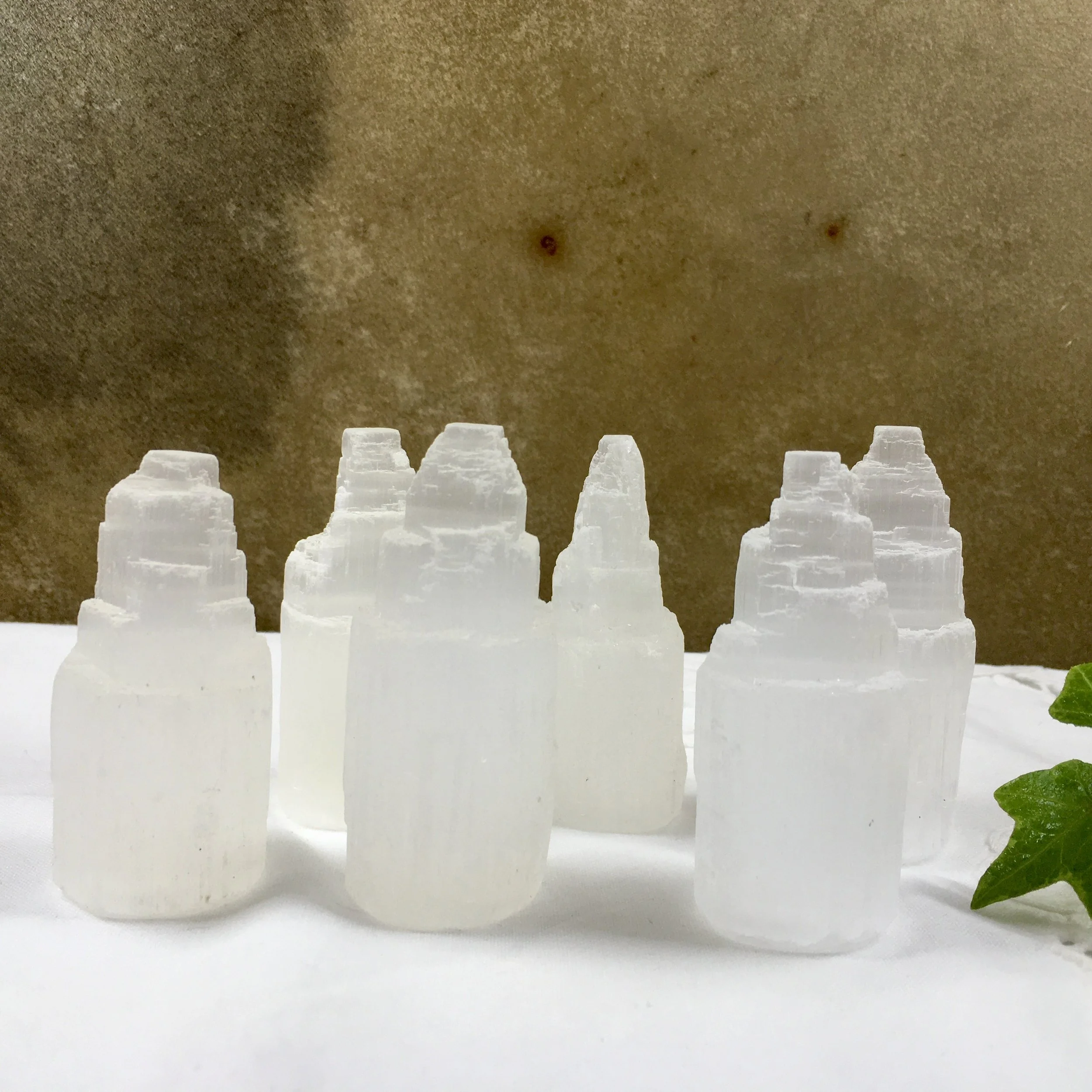 Selenite Tower 6cm group.jpeg