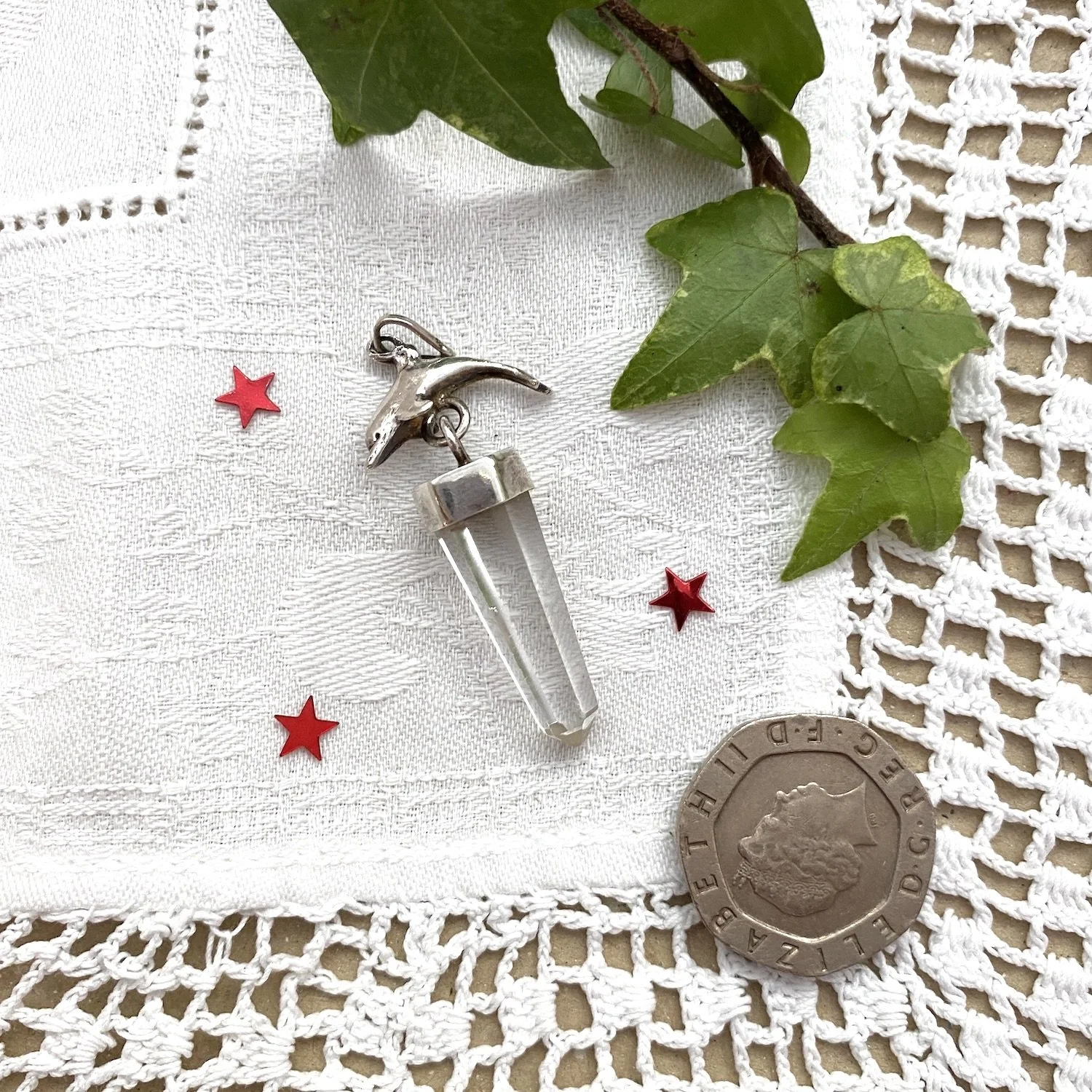 Quartz dolphin pendant b.jpeg