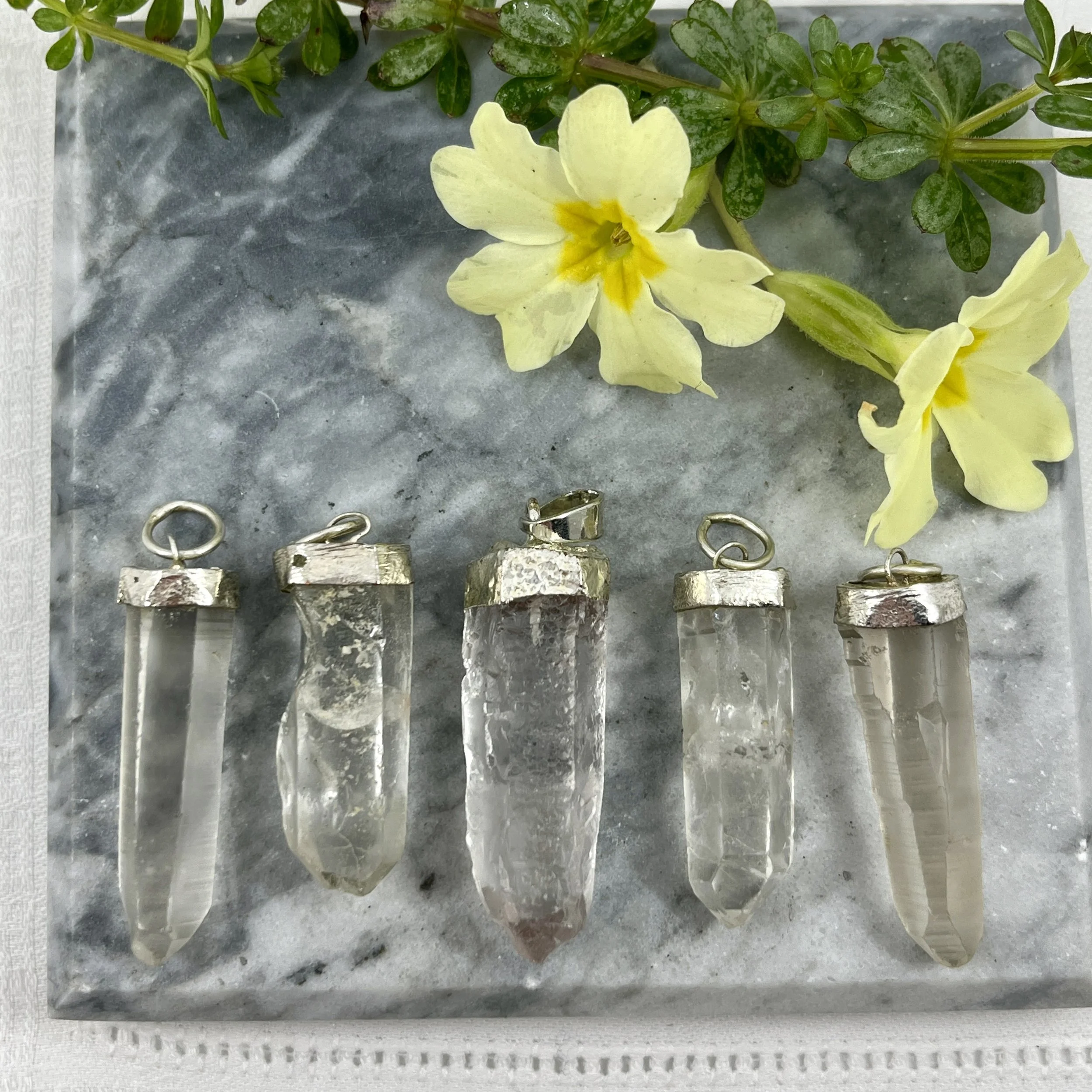Quartz crystal pendants.jpeg