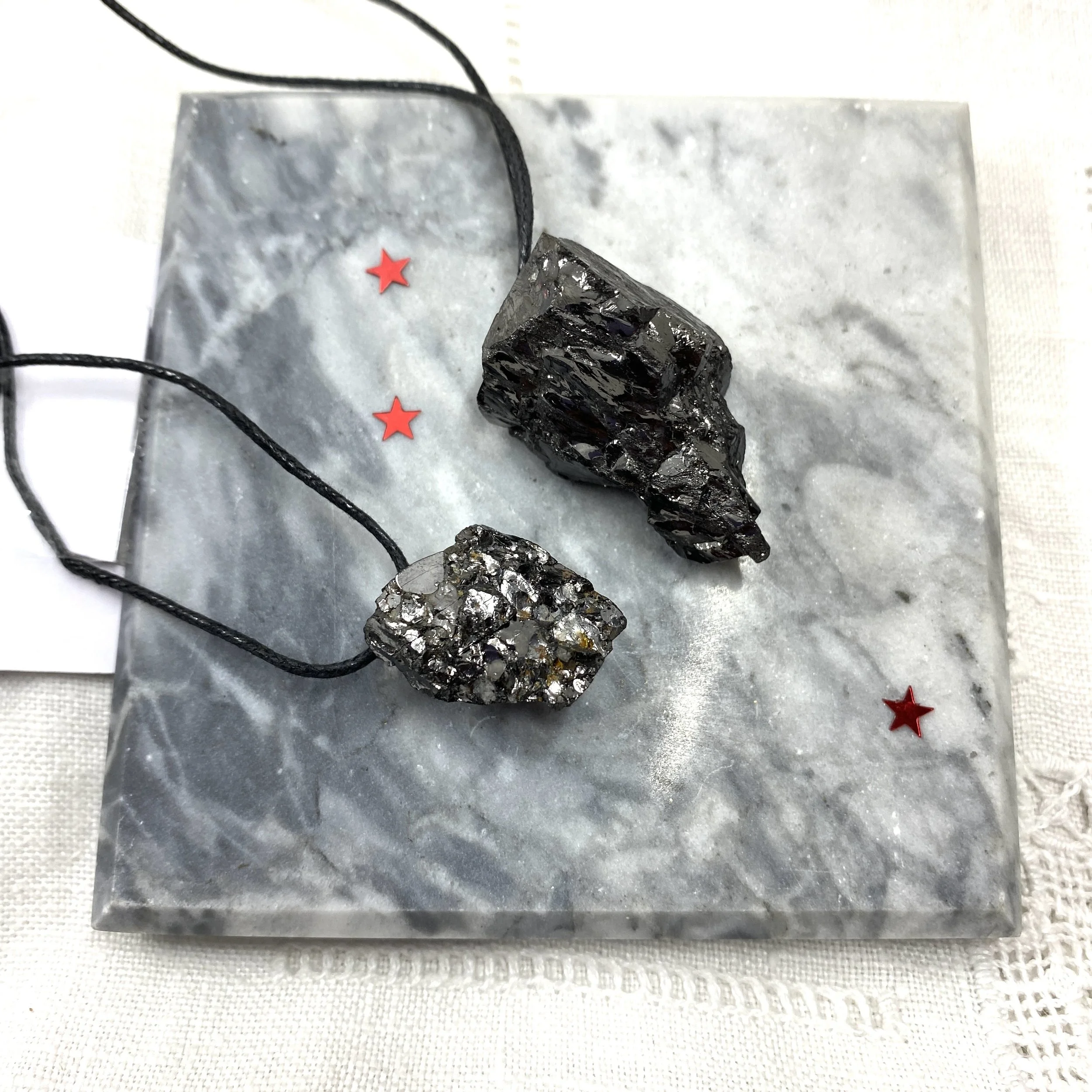Shungite pendants elite 2 sizes.jpg