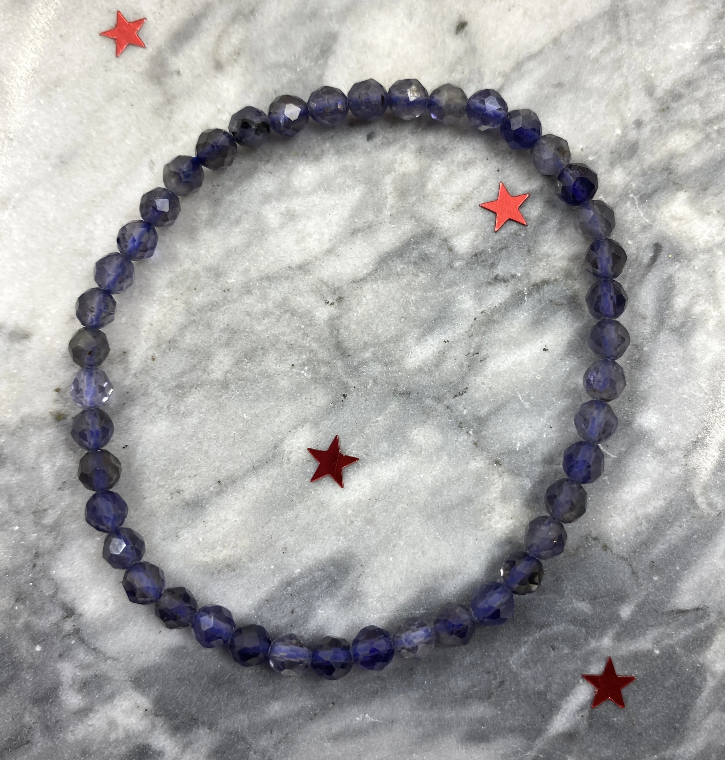 Bracelet_Iolite 4mm facet2.JPG