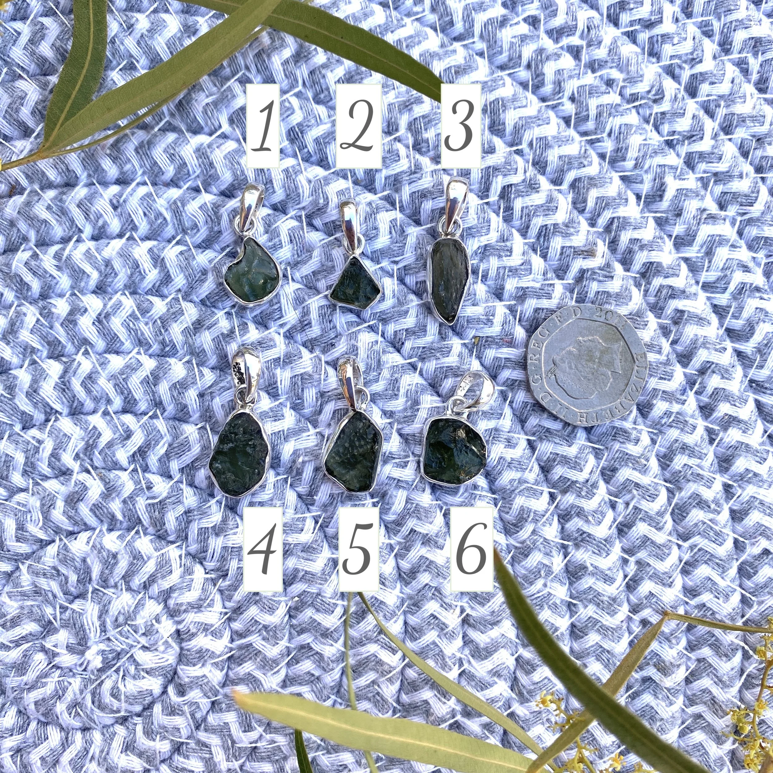 Moldavite pendants Tucson Show1.jpeg