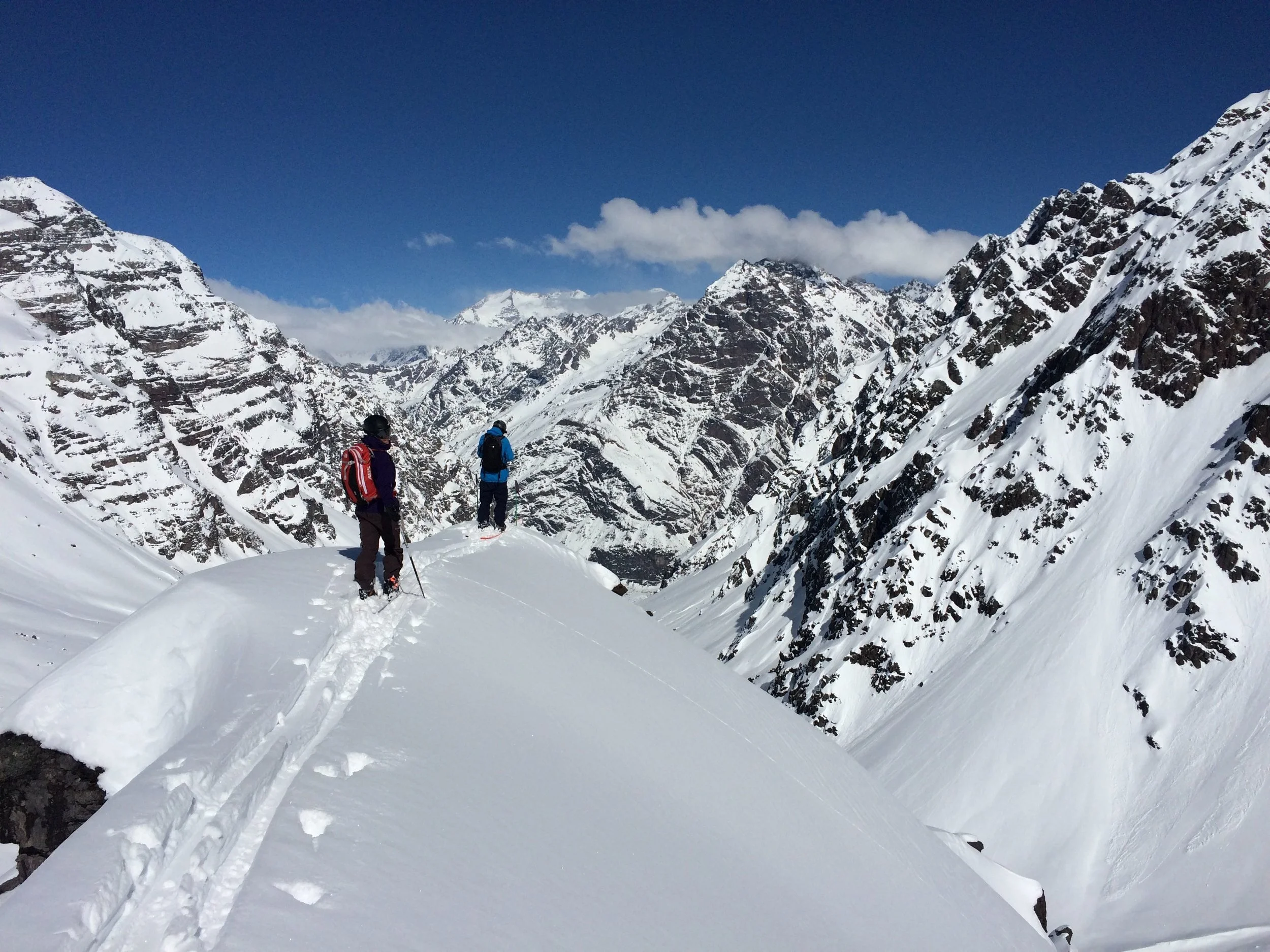 Standing on top, taking deep breaths, getting ready to drop in and get all that buttery snow.