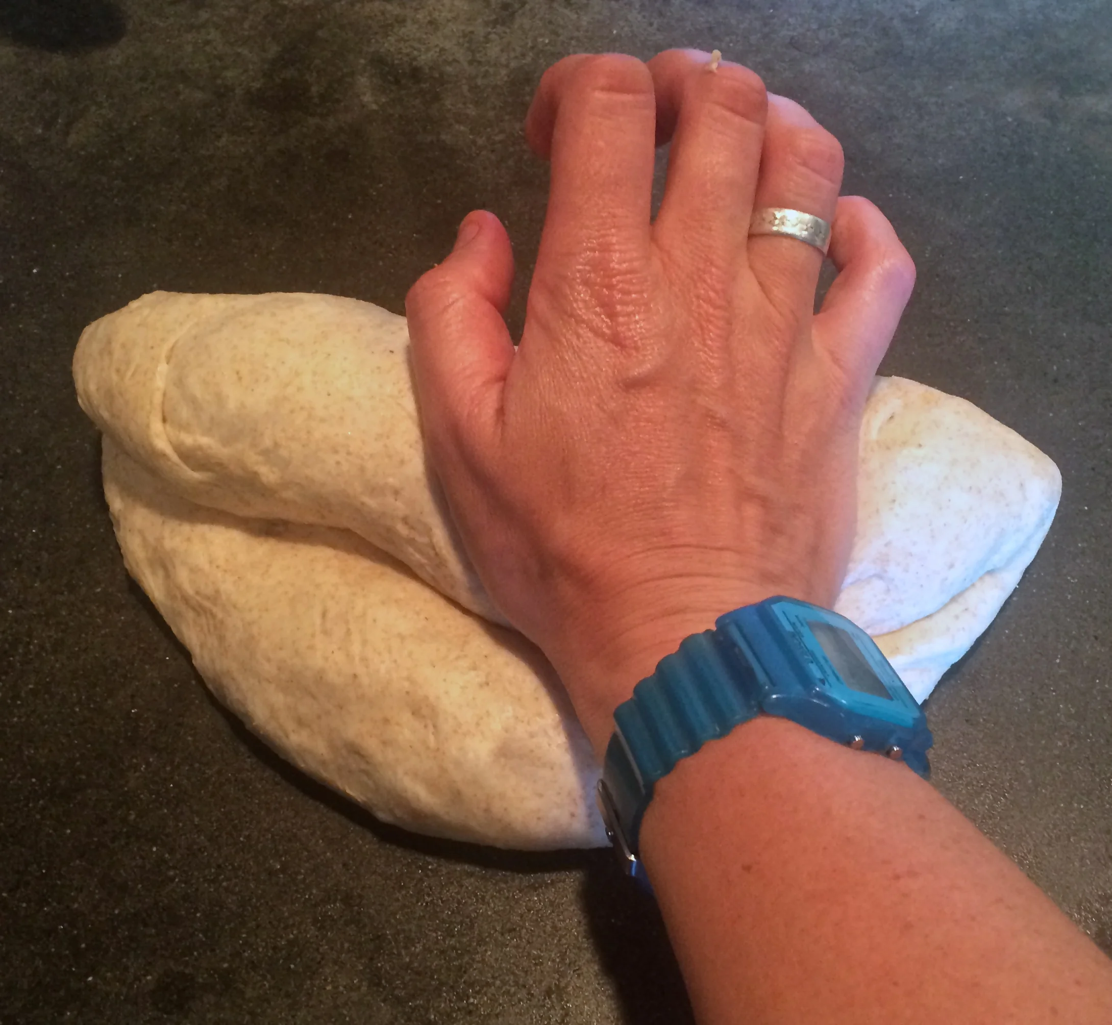 I roll with the left hand as I tamp down the roll with my right hand, working right to left.