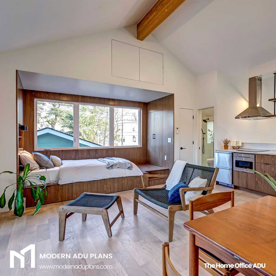 A cozy bed nook creates a nice separation between living and sleeping areas in this very tight ADU. Wrapped in warm walnut wood, and with an expansive window, the bed area feels like you are sleeping in the trees. 

Creative design solutions like thi