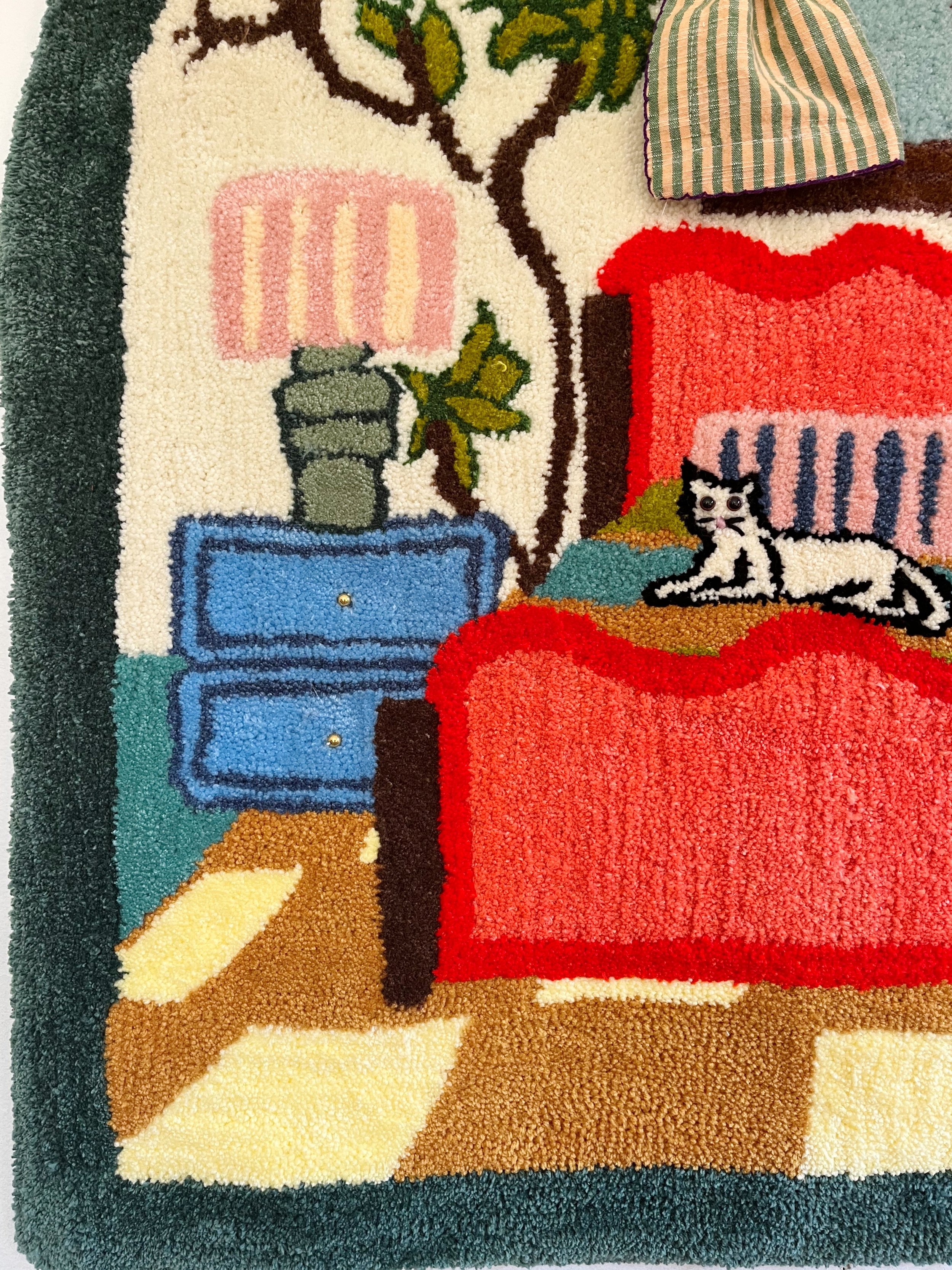 Side view of Tufted Home #4 highlighting the 3D texture of the tufting and the soft fabric curtain elements. Modern handmade wall art from Charleston, SC.