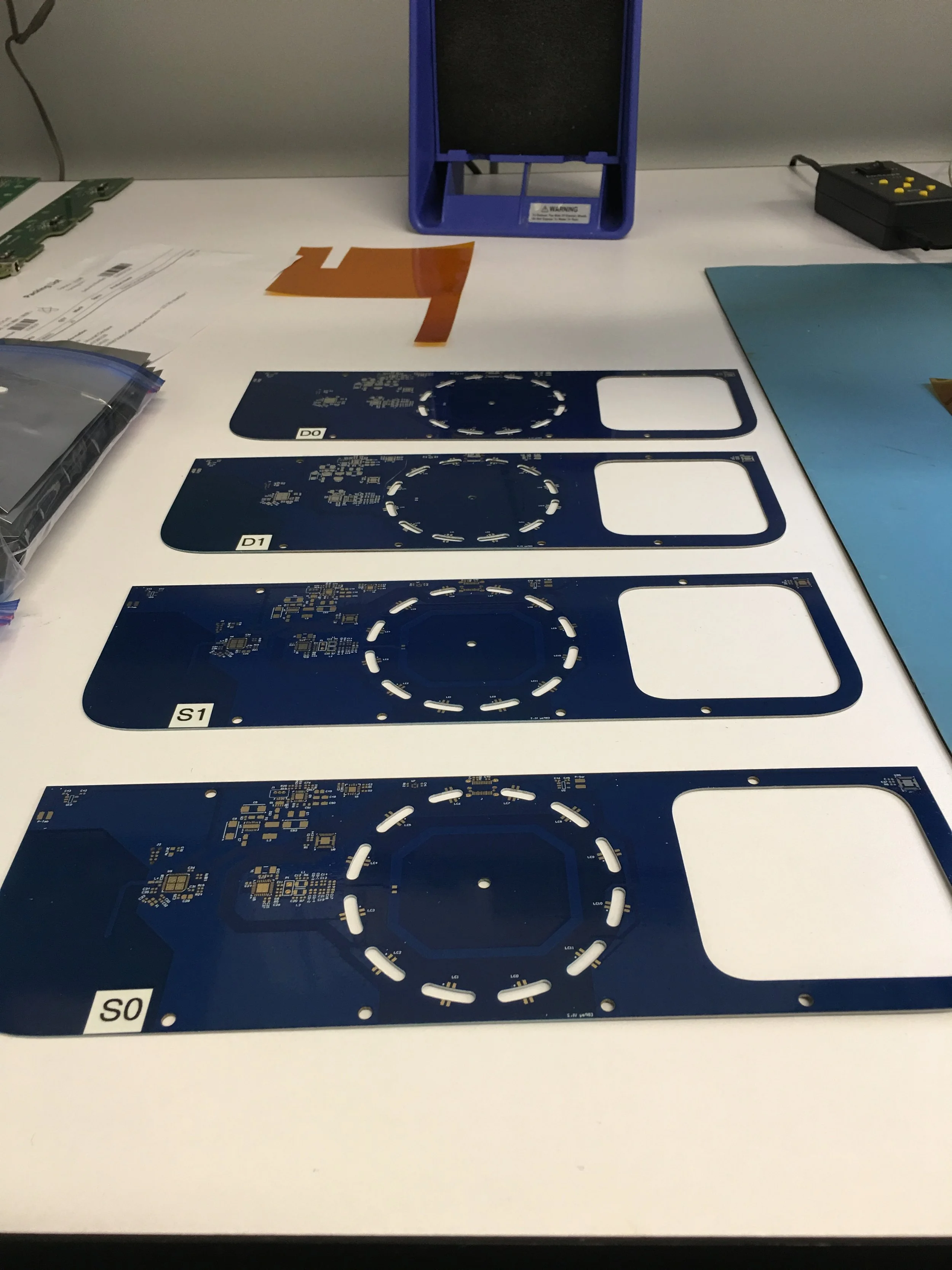  Rev2 of the PCBA in include indicator LEDS, and slot for   Square Reader Payments. 