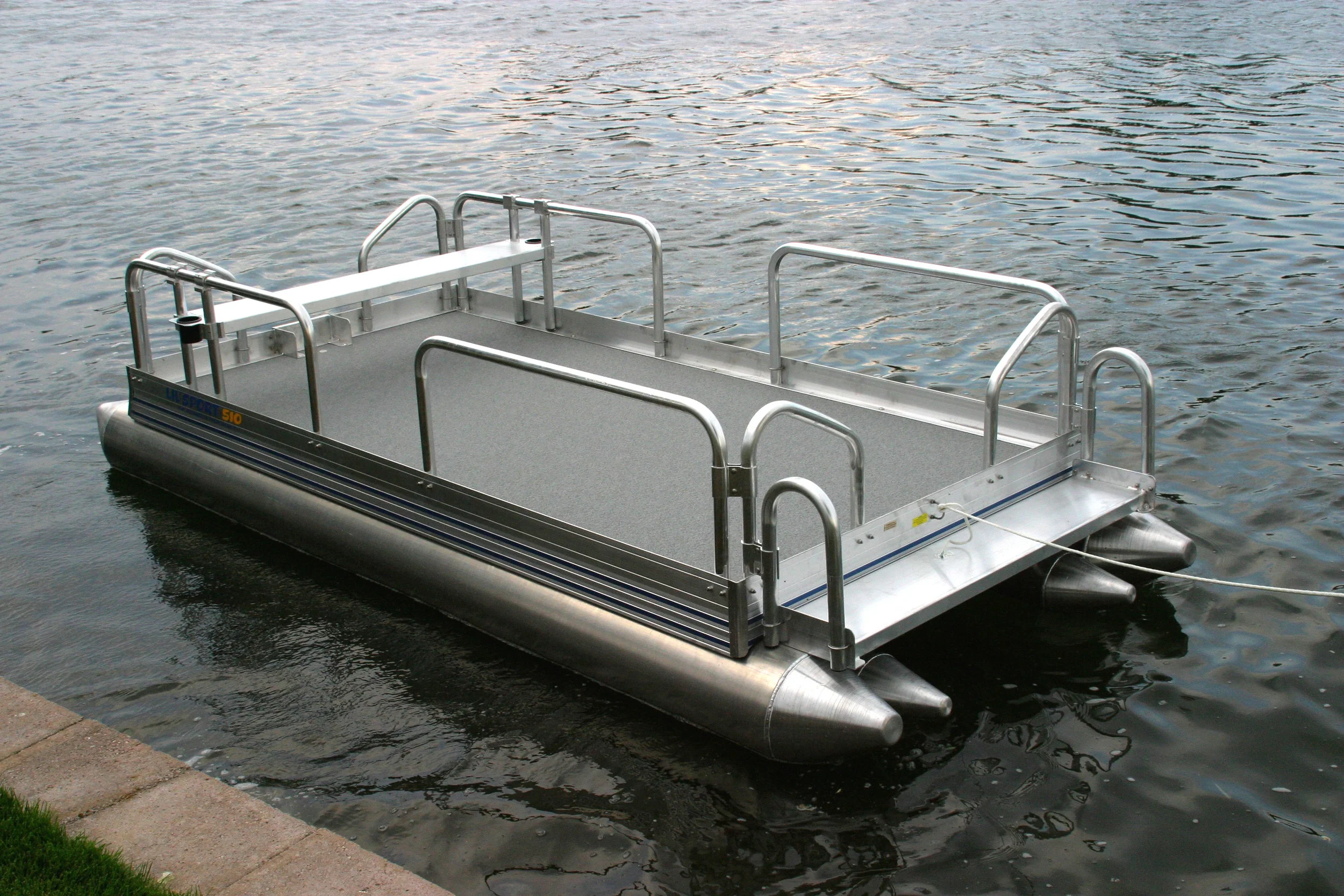 Lil' Sport shown with optional bench seat above. If you are a lakefront home owner that has those grand kids stopping by that want to get on the lake, or you just want to cruise yourself, this is the perfect little craft that will last for years with very little maintenance. Keep in mind, this craft like all our other models will float in less water than a prop will run in due to its low center of gravity and multiple floats that give it the ultimate in bouncy for a boat this size. Being able to float in 8" or less water, makes it the ultimate platform to fish those hard to get to fishing holes. ( Do not mistake the 8" for draft ) Draft on this craft will vary depending upon how you have your boat loaded.