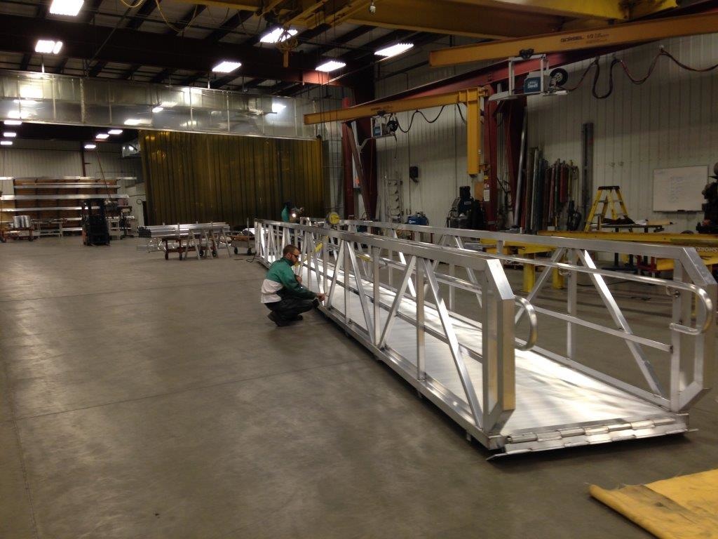 Custom designed and manufactured for the State of Nebraska, this 50' x 5' all aluminum walkway is a fine example of what our capabilities are when it comes to satisfying the customer. This unit was installed in the McCook, Nebraska area. 