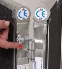 Rotation of pin either locks or allows ramp to be separated into two pieces.