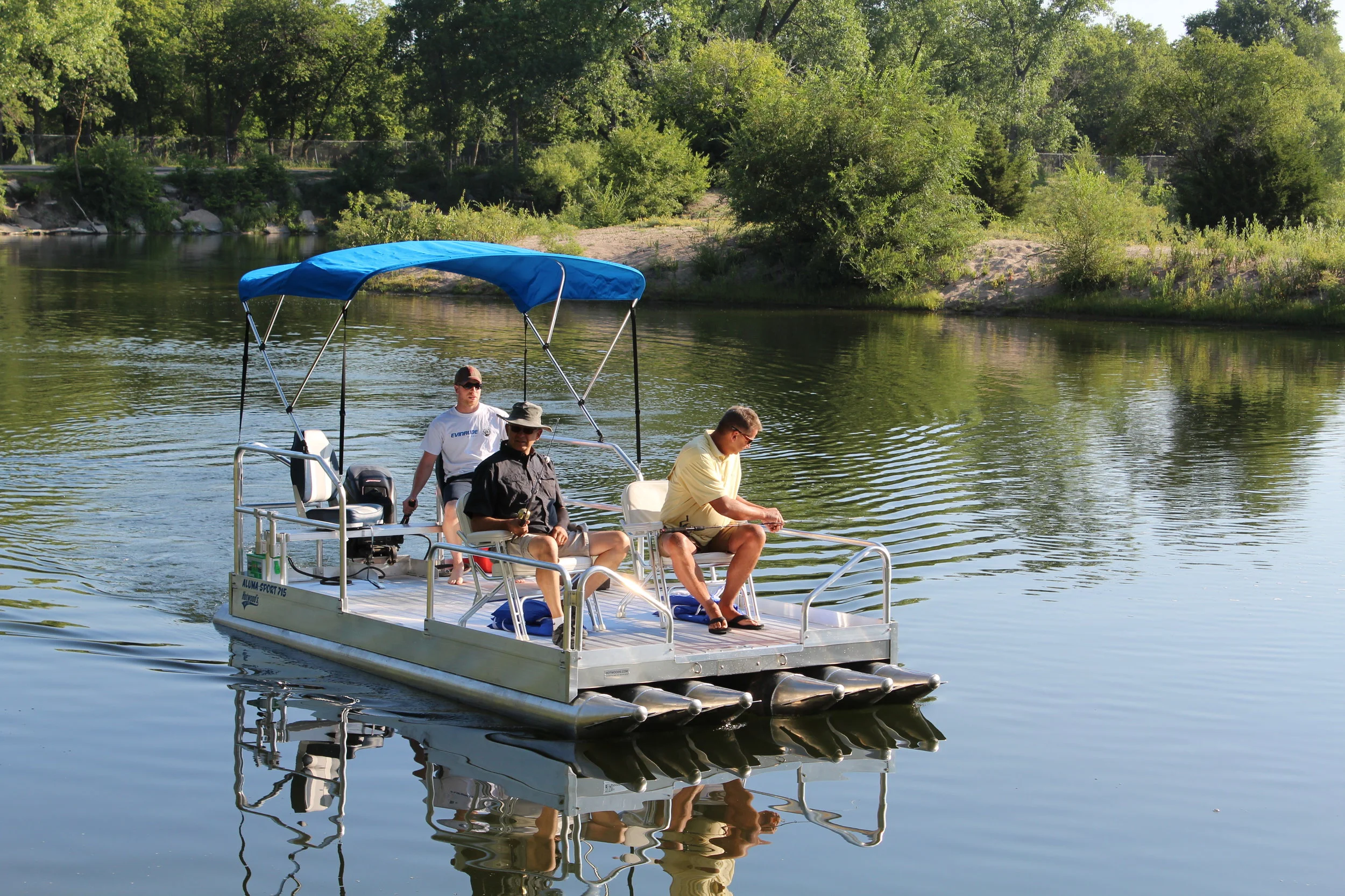 Check out the all new 716 Aluma Sport pontoon boat, new for 2018. With 1,600 lbs. of capacity and a 25 hp rating, you will have the ability to carry more weight and move across the lake at faster speeds to get to those favorite fishing holes or locations across the water. ( Boat above is shown with optional canopy top, seating and 25 hp. outboard motor.) This 7' wide x 16' long all aluminum pontoon boat is packed with ( 6 ) 12" floats that by far give it the most stable platform in the industry for a boat this size. Pontoons are .090 thick aluminum, with .100 thickness on cones and end caps.( That is the heaviest in the industry ) The 716 Aluma Sport weighs 875 lbs, with the trailer weighing 620 lbs. for a combined pulling weight of 1,495 lbs. That makes it very easy to pull with the lightest pickup or like vehicle on the road. We are personally involved with every boat we have ever designed or manufactured, and after 2 years in development, we can say, this boat is incredible when it comes to maneuverability and stability. We have just never seen anything like it on the water. This craft is literally like walking around on your patio. Quality, you need not question the construction of this craft, like all our pontoon boats and docks we manufacture, there is nothing to compare them to. The 716 Aluma Sport is manufactured completely of aluminum with stainless steel hardware. We tell people everyday they could bury this boat and dig it up 20 years later and go boating. We are now in full production and taking orders on the 716 Aluma Sport and Shoreland'r trailer. ( Please call for pricing and delivery dates toll free 877-407-8645 )