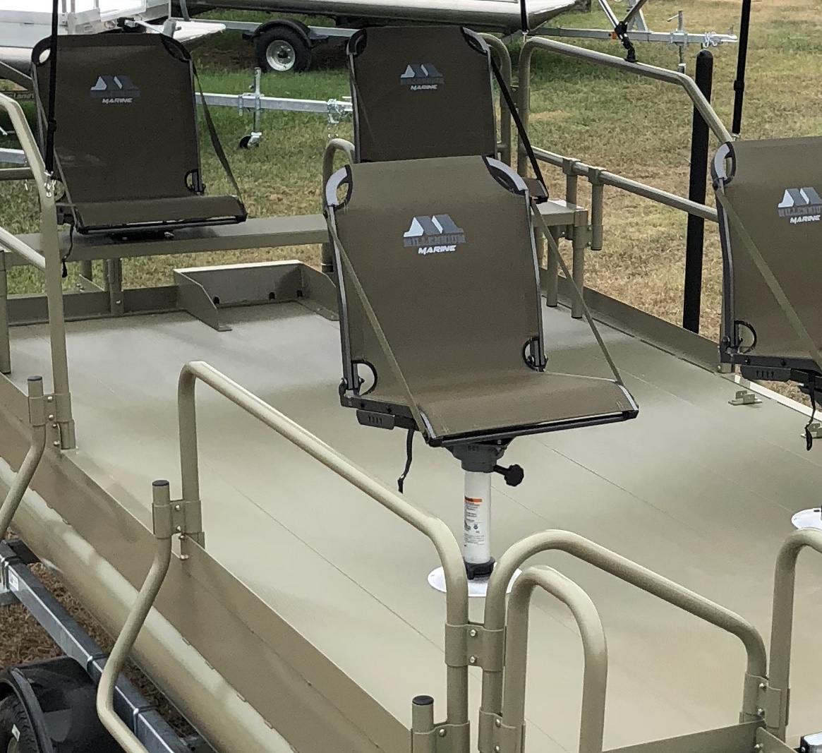 Shown with 4 Millennium seats ( 2) mounted on swivels on the rear bench and ( 2 ) on removable pedestals on the front.