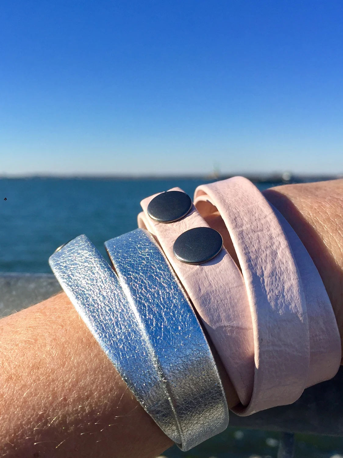 pimk and silver bracelets worn.jpg