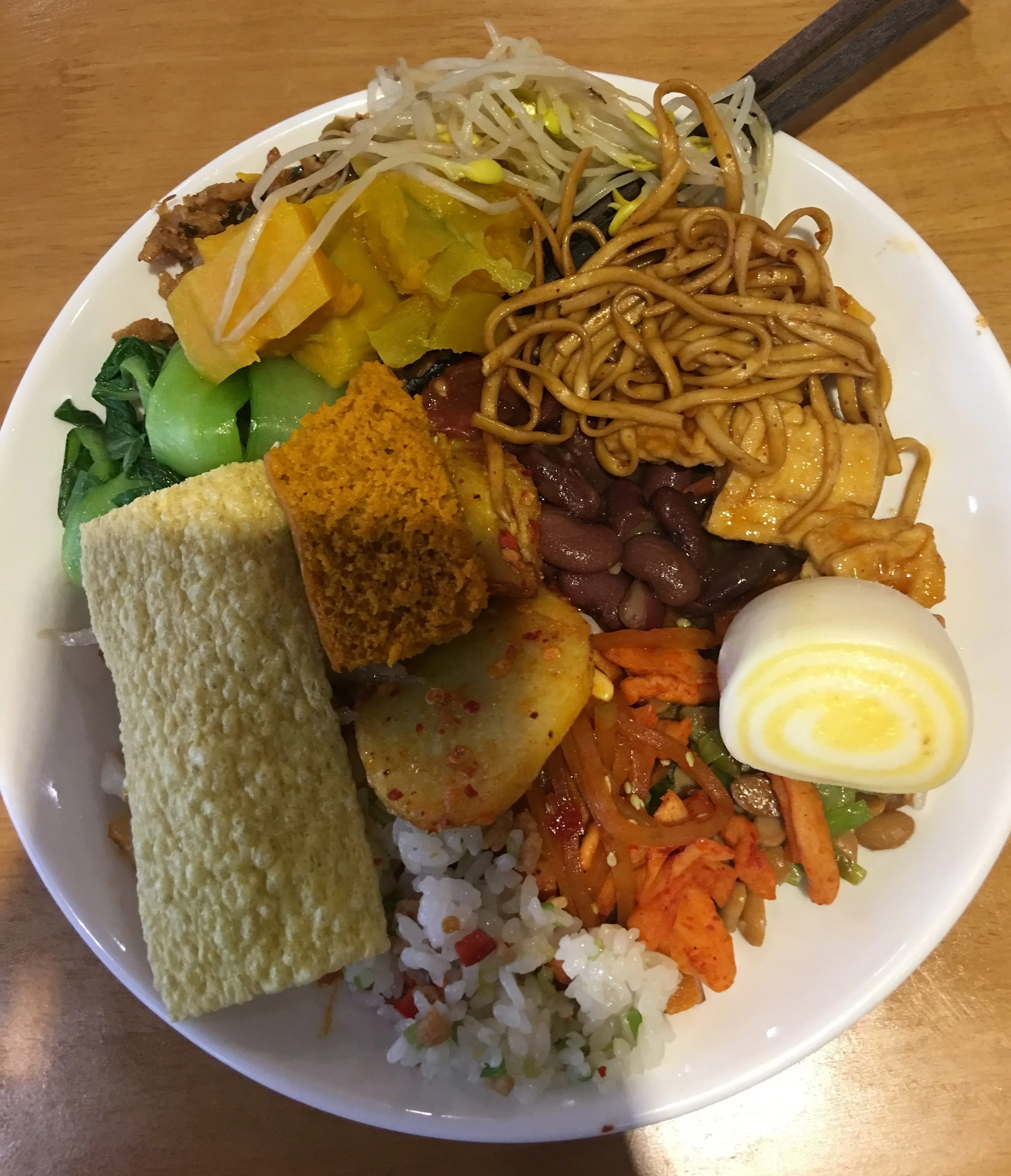In Buddhism, wasted food is frowned upon, so I had to eat it all.