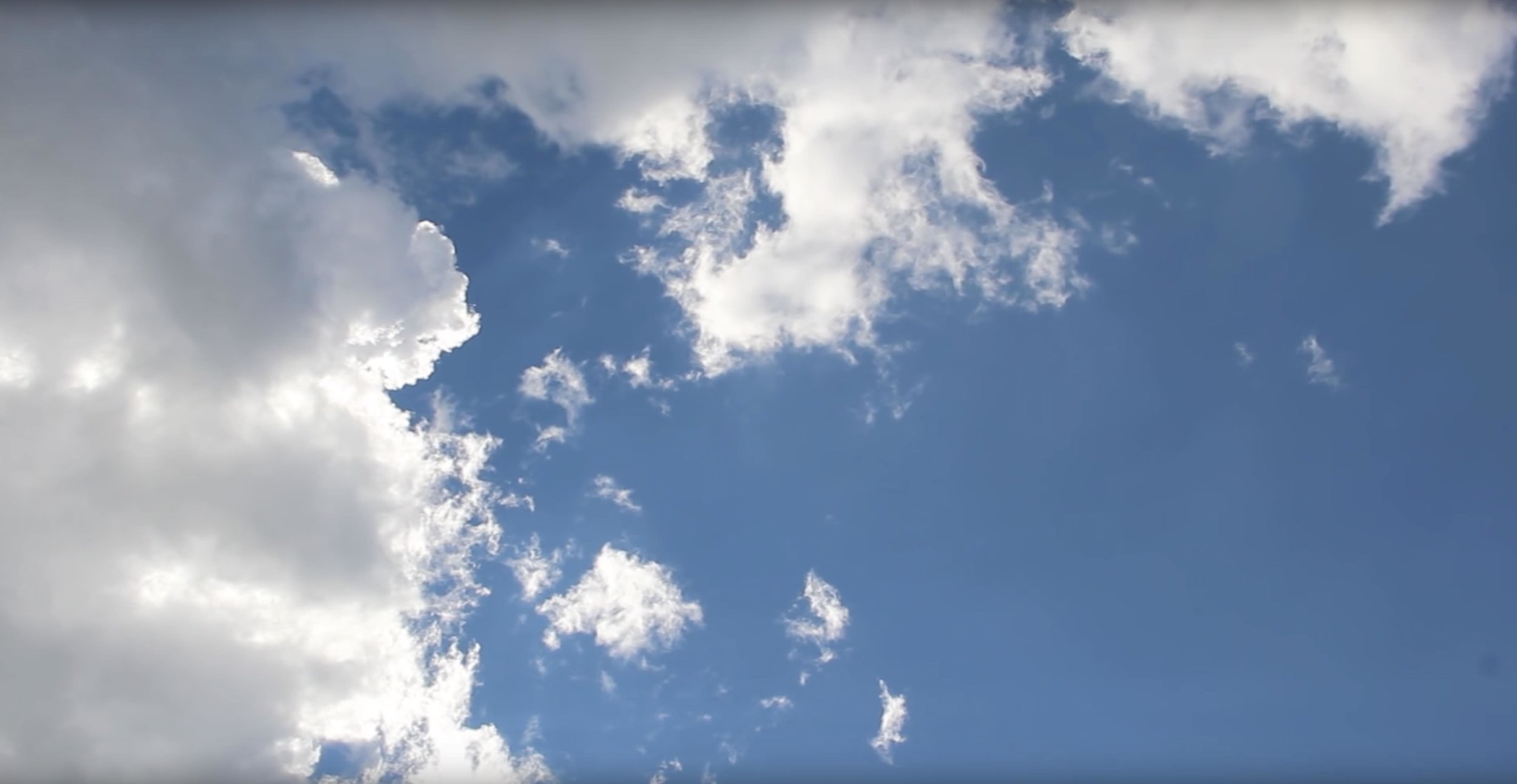 clouds bg landing page.jpg