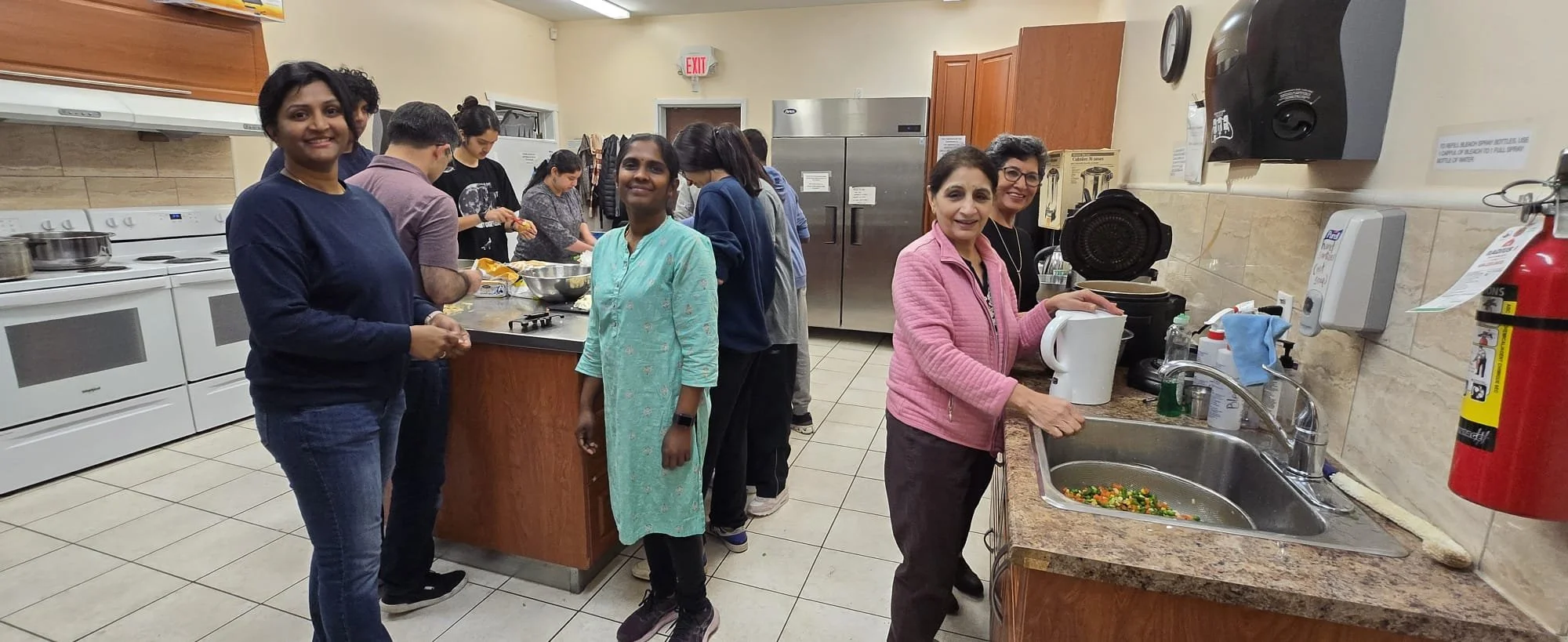 In October 2025, YLSBC youths and parent mentors were in the kitchen to help prepare the hot meals.