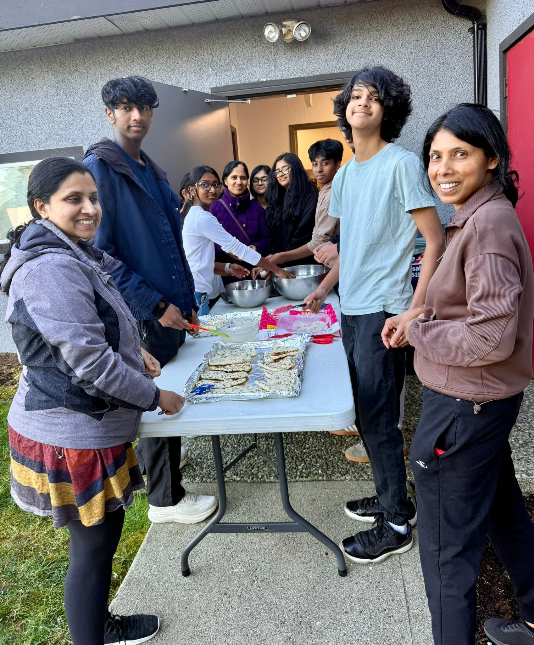 In March 2026, YLSBC youths and parent mentors were in the kitchen to help prepare the hot meals.