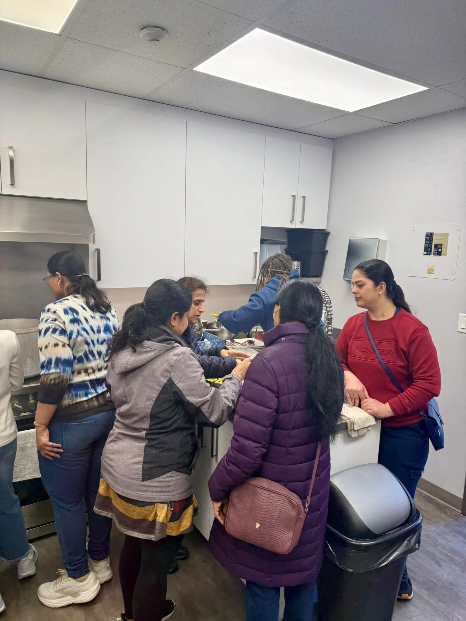 In March 2026, YLSBC youths and parent mentors were in the kitchen to help prepare the hot meals.