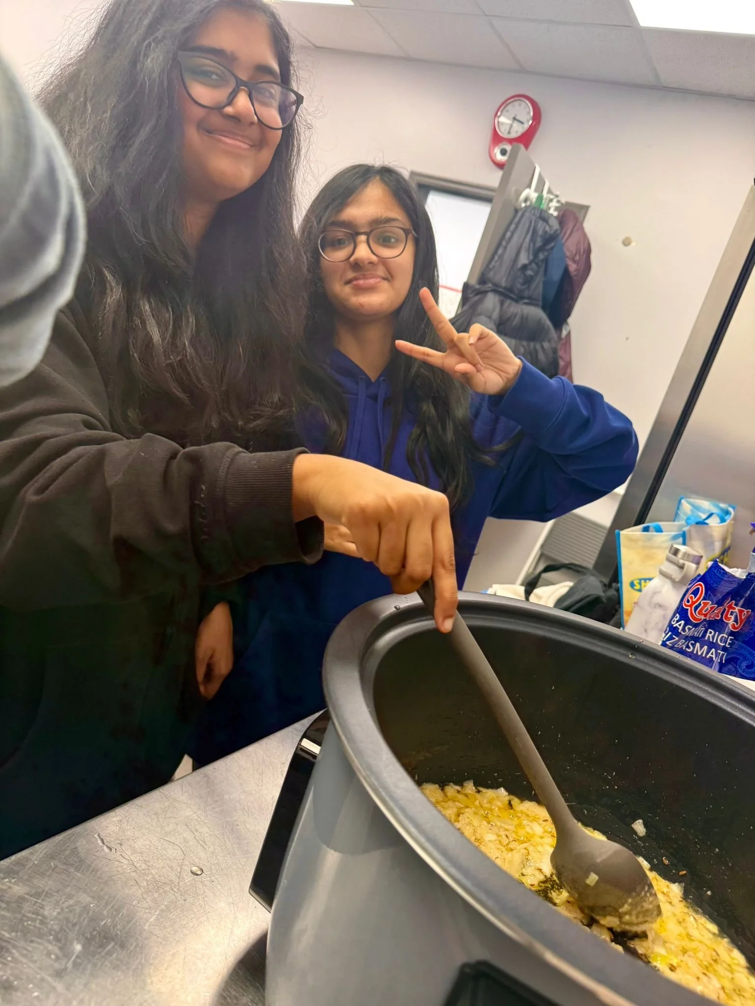 In March 2026, YLSBC youths and parent mentors were in the kitchen to help prepare the hot meals.