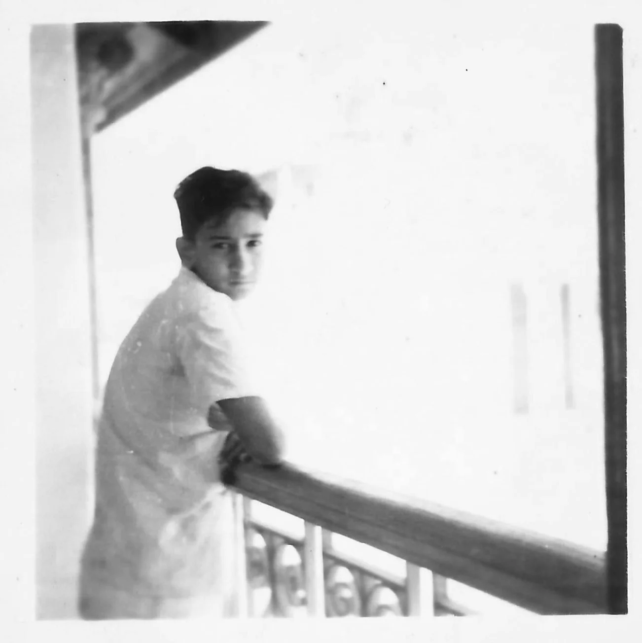 A teenage Pestonji on the verandah of The Bhuj House — his childhood home.