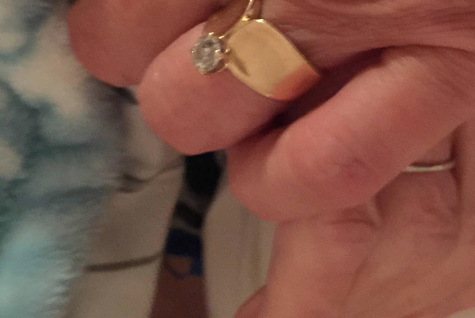 My hand with Nadine's... and my diamond... 