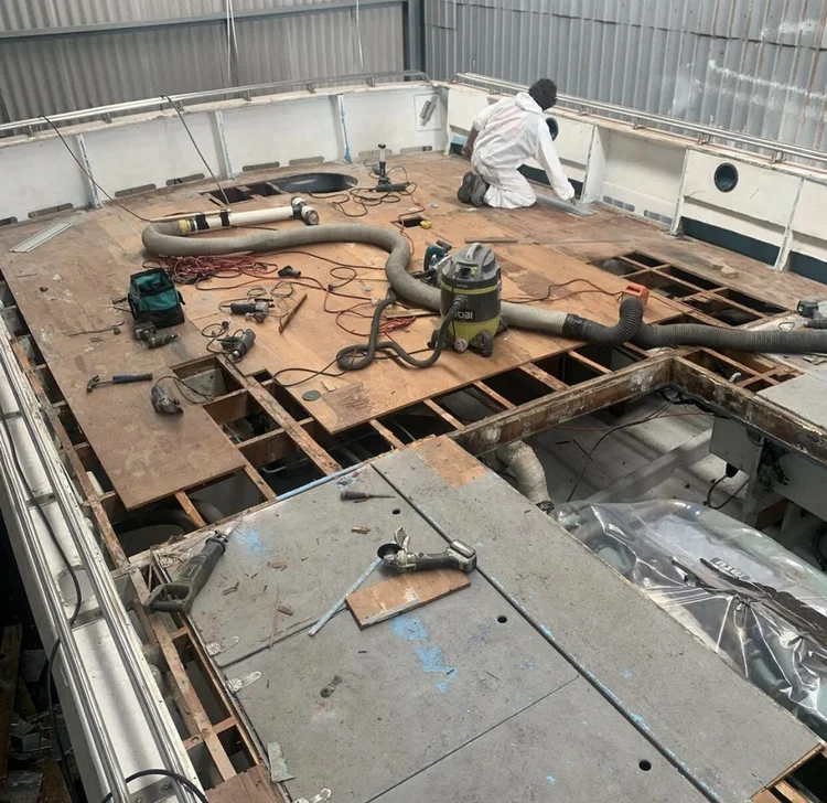 Saratoga, a 1958 timber boat, under rot repair to the underwater gear
