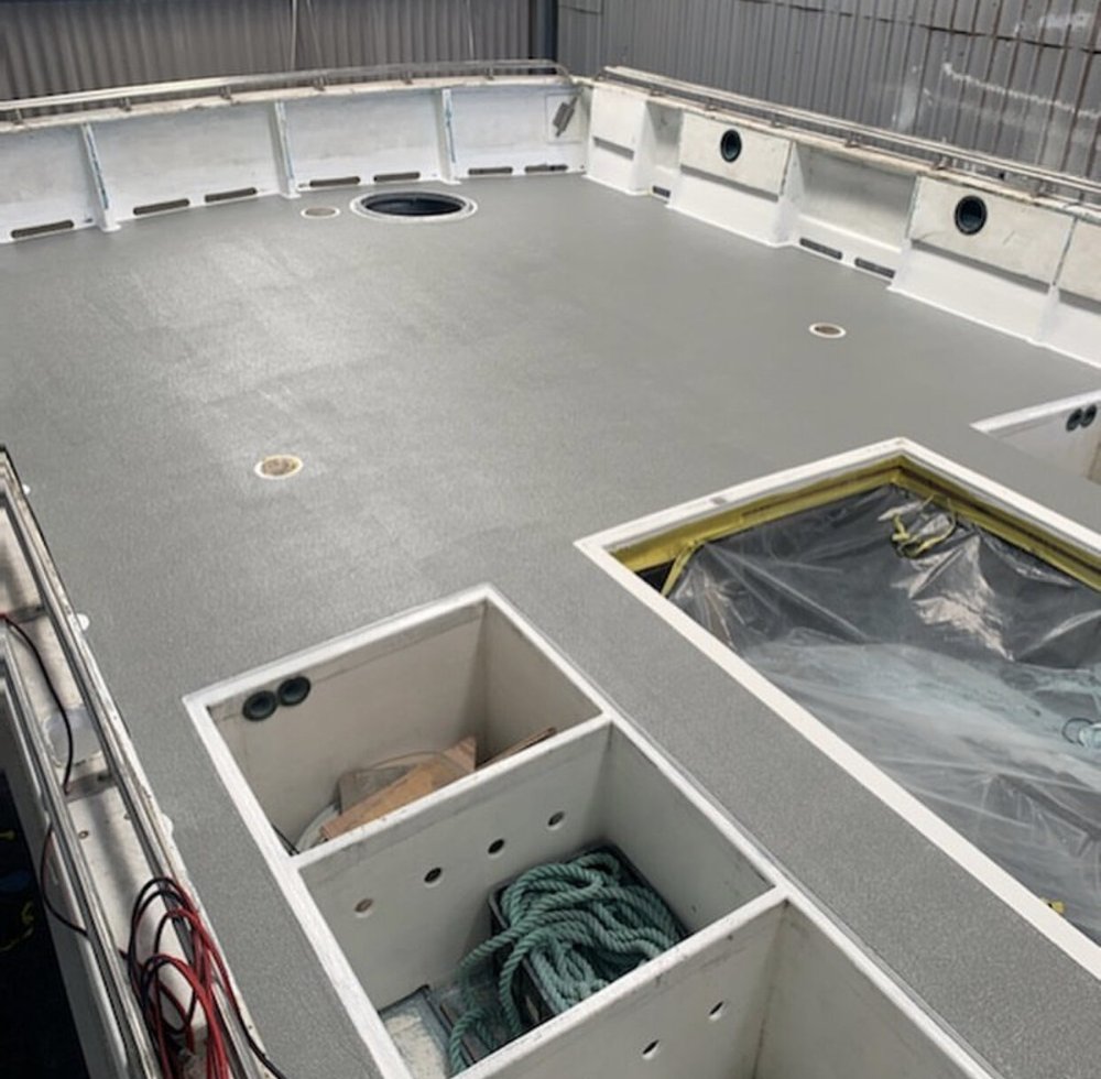 Fibreglass rebuild work on a damaged hull section as part of an insurance repair