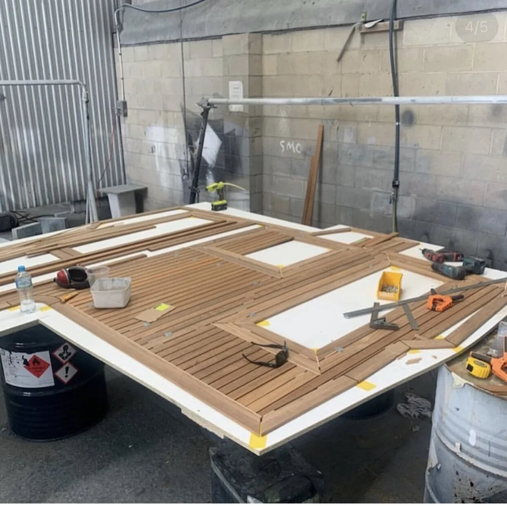 A new Burmese teak deck laid on a boat at the Fremantle yard