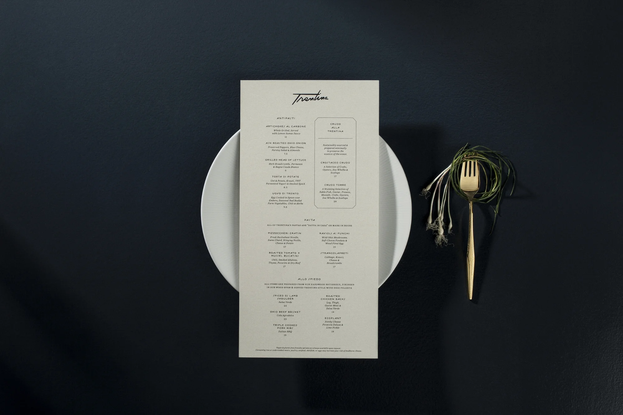Menu design and branding for Chef Jonathan Sawyer's restaurant Trentina by the studio of Christine Wisnieski. 