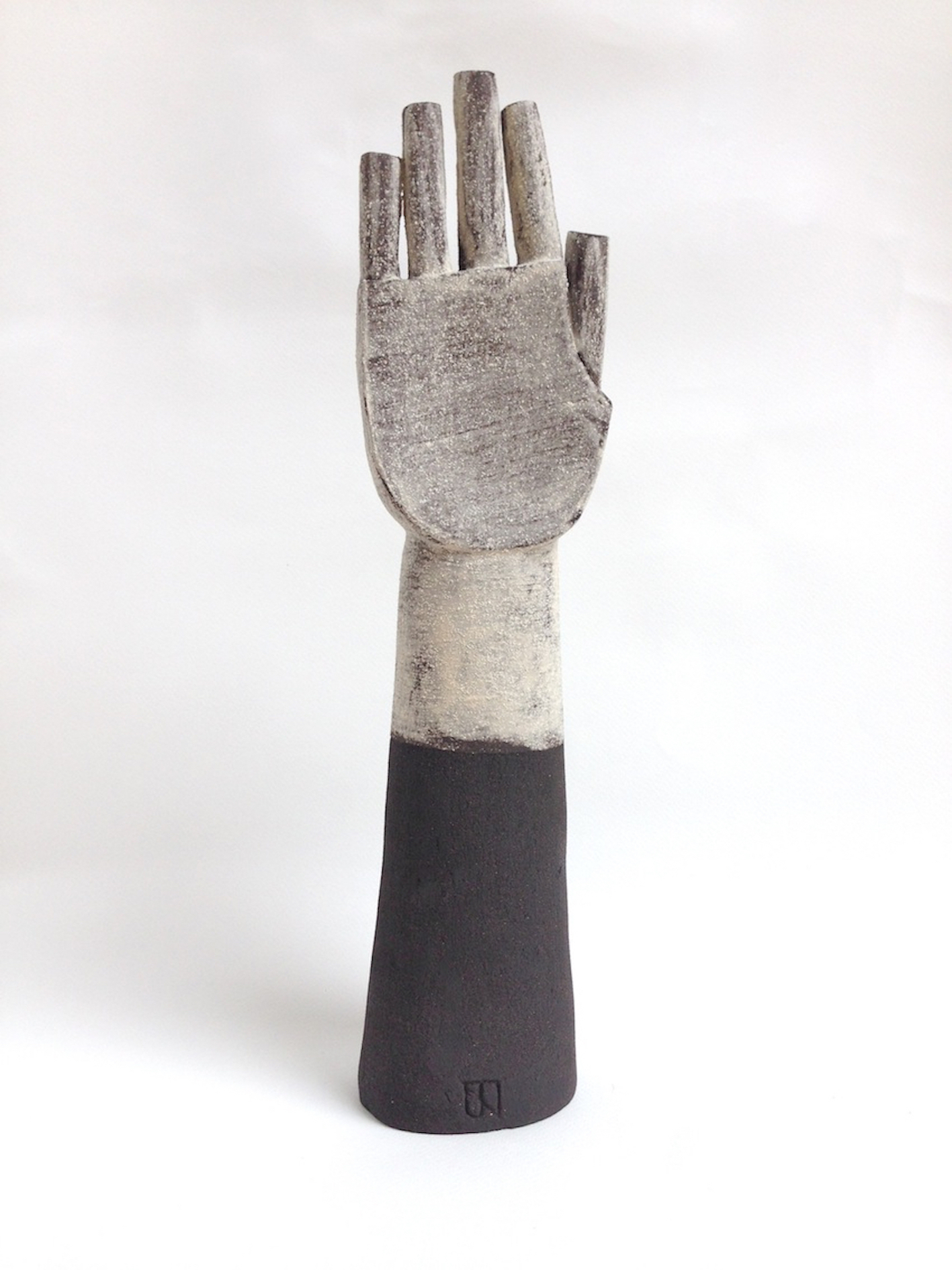  Title: White Glove Size: H 35 x W 12 x D 9 cm Medium: Black stoneware 