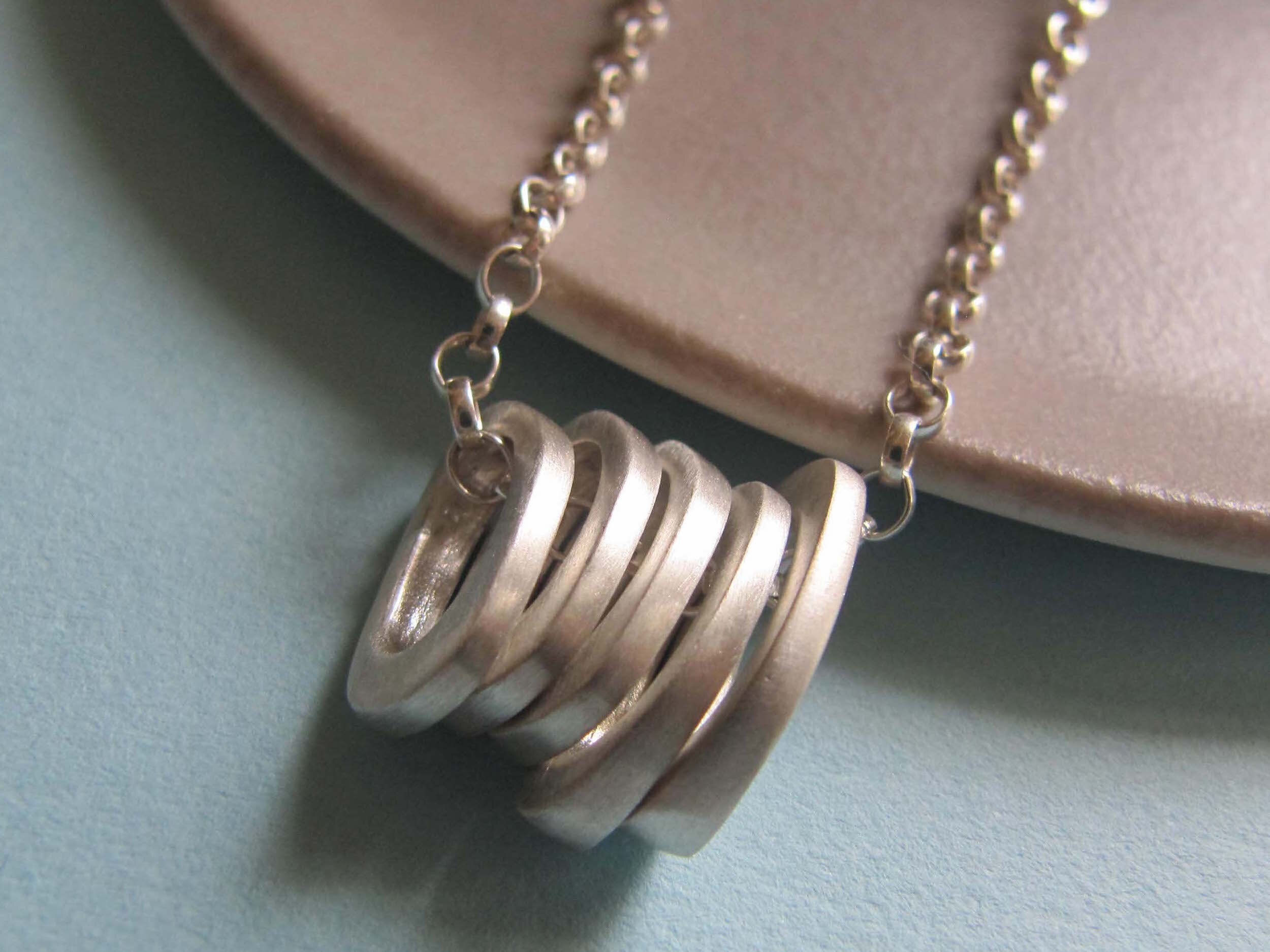  Title: Infinity Five Stacks necklace  Medium: Silver  Price: £155 