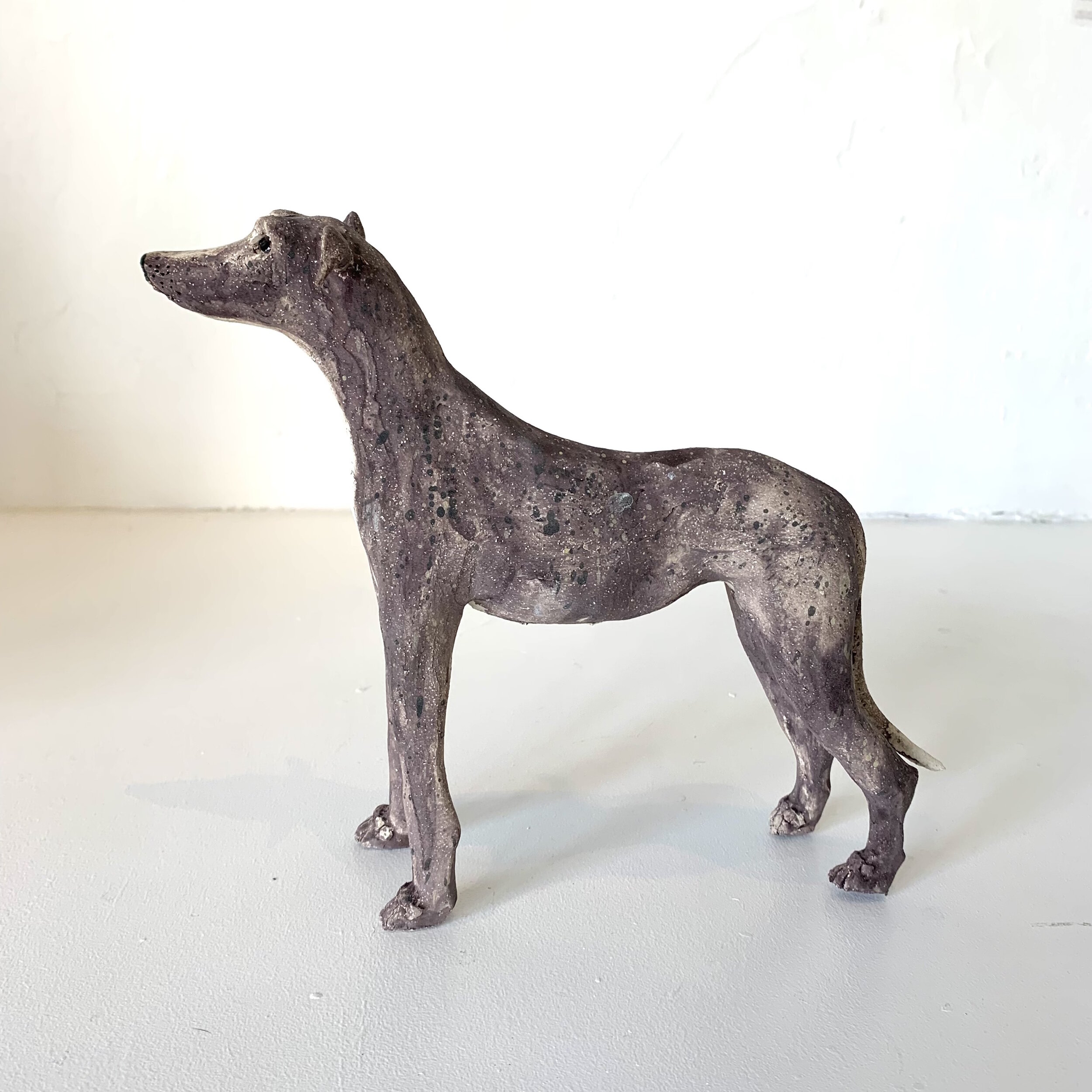  Title: Brindle Greyhound Size: 20cm H x 5cm W x 24 cm L Medium: Earthenware &amp; underglaze 