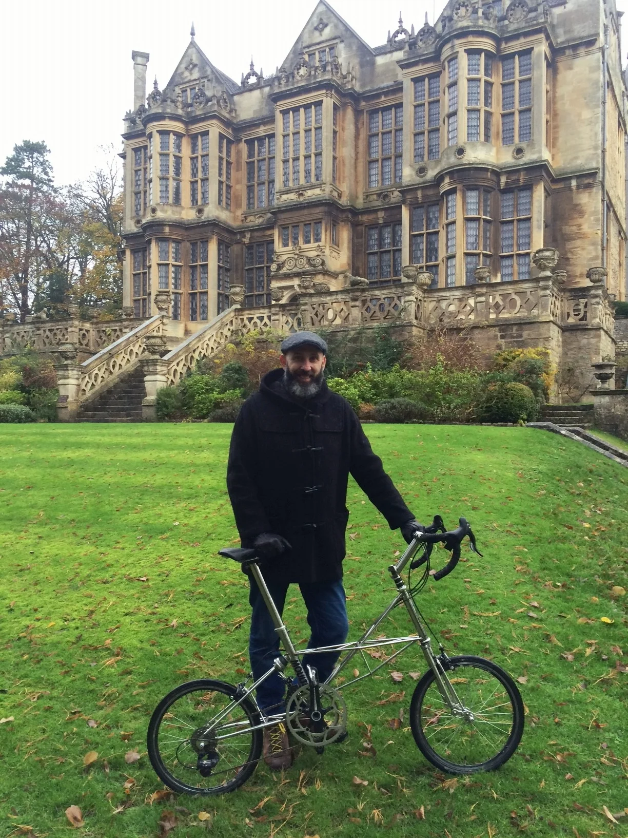 A very cold, wet, but still smiling Fran Martin in front of the Hall with the Moulton Speed.