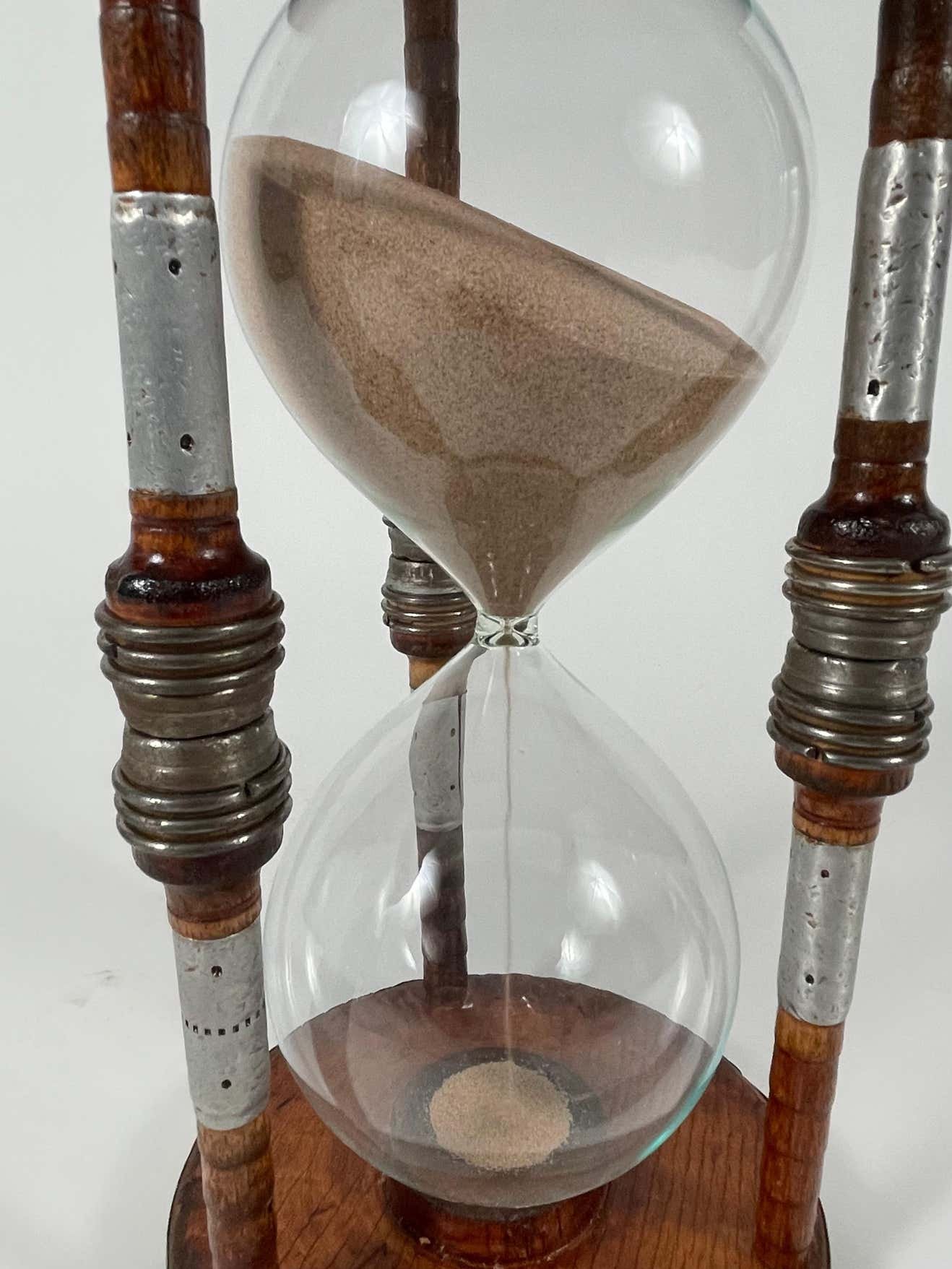 Large wooden sand timer made made from genuine antique Victorian bobbins 