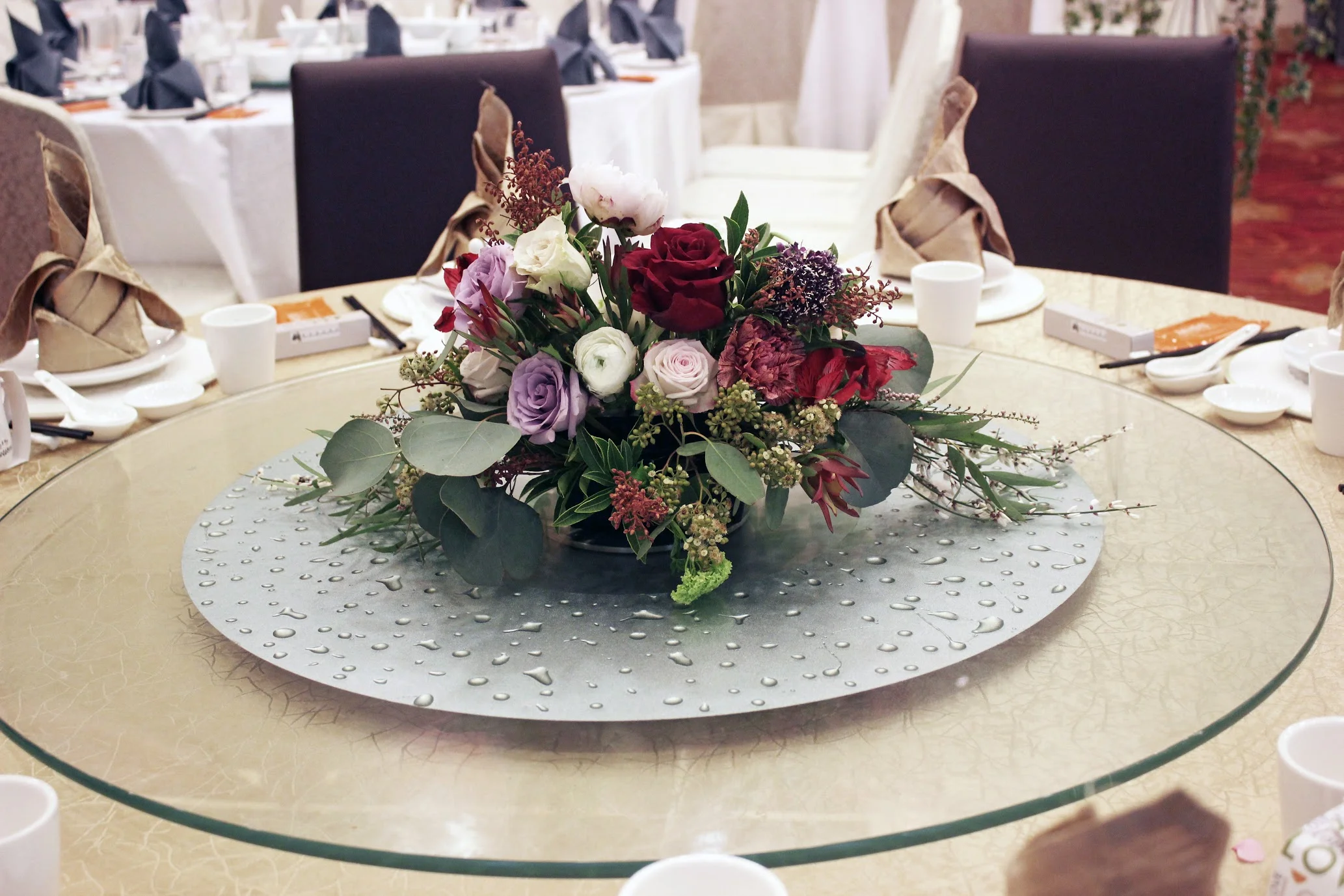 Above: A rustic centerpiece for VIP table. Left Below: A modern minimalist take on our copper floral arch covered with delicate flowers. Right Below: Photobooth Backdrop designed by Wedding Carpenter with our add on interpretation of floral garland concept attached to the board. We love to think outside the box and continuously pushing our boundaries to create something unique.
